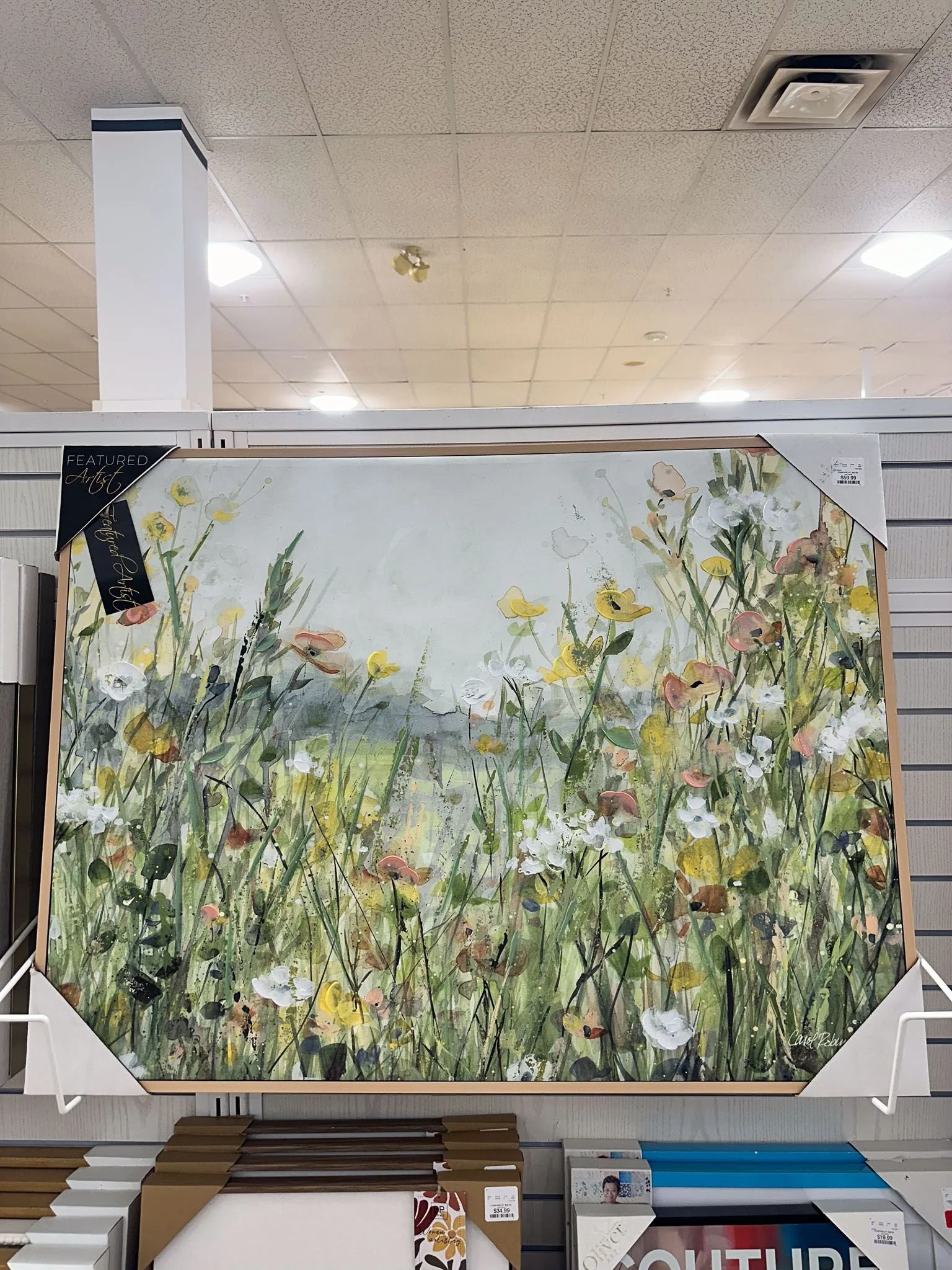 Organized college dorm room wall art display showing creative dorm room decorating essentials.