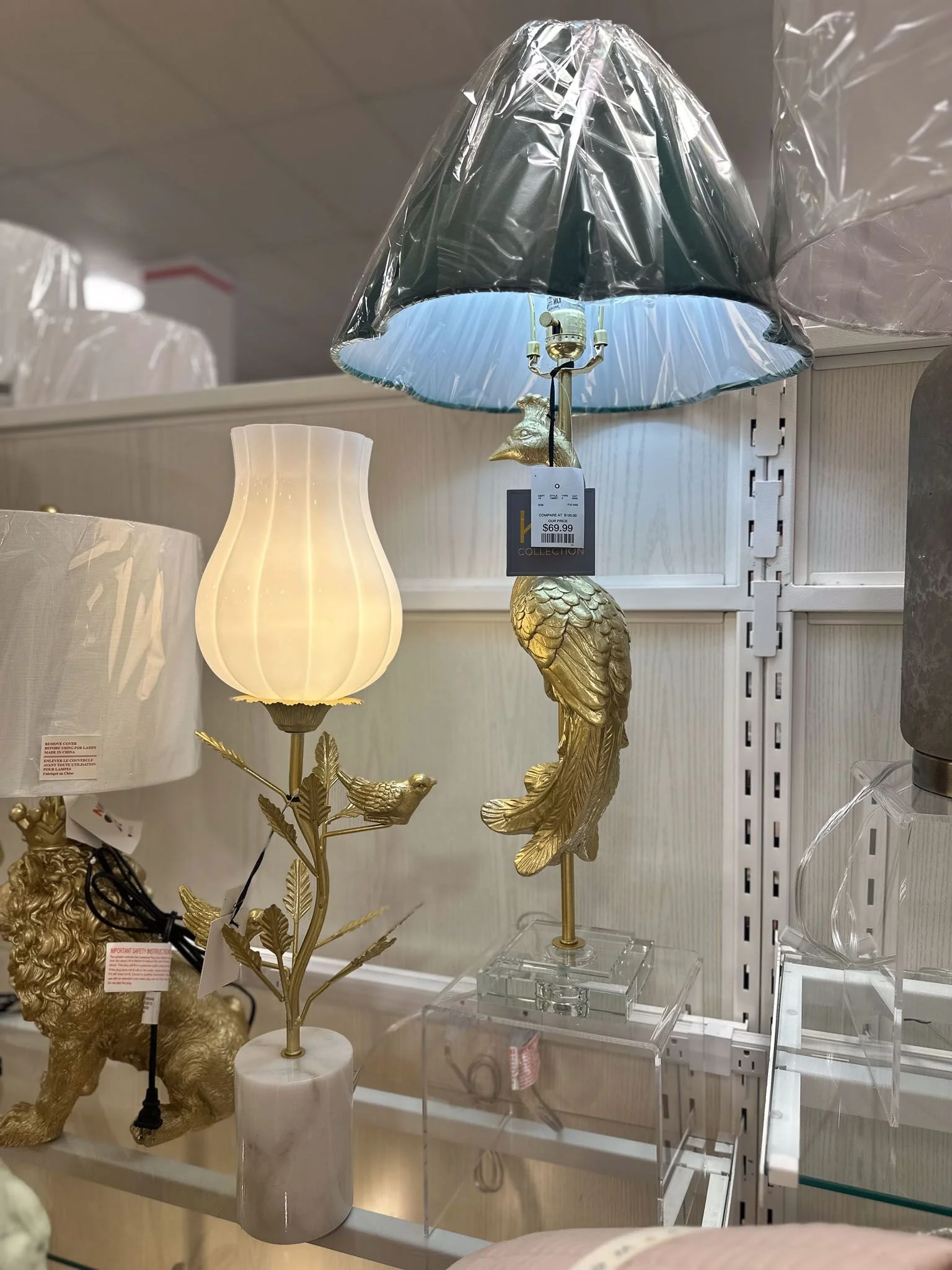 Elegant glass and brass table lamps as lighting essentials for college dorm room decor ideas.