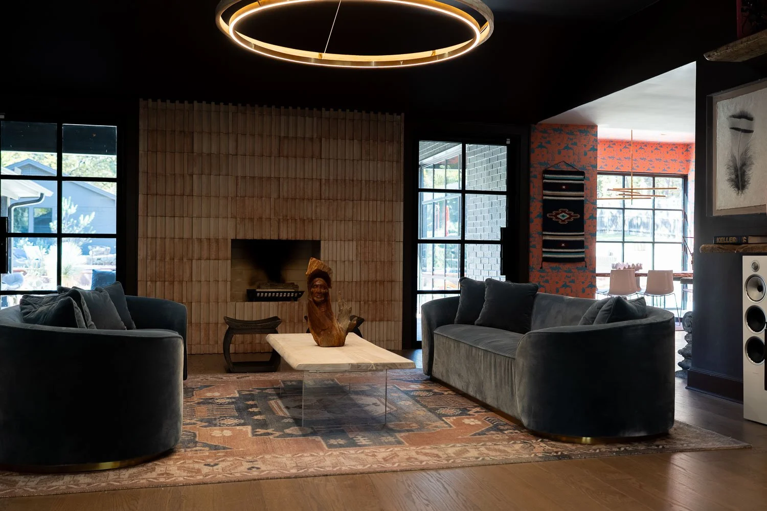 Professional interior design business consultation showing designer reviewing materials with client.