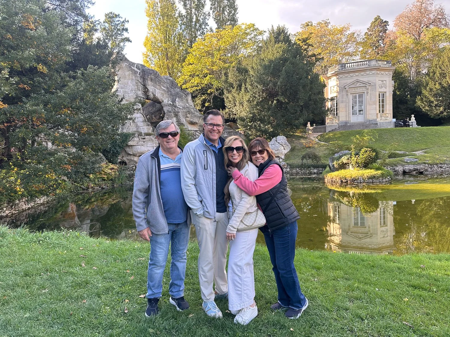 Nashville interior designers create family-friendly outdoor gathering space with modern aesthetic.