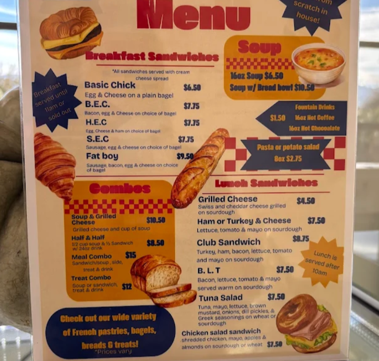 Menu board with breakfast sandwiches, soups, lunch sandwiches, combos, fountain drinks, and pasta or potato salad options, including items like basic chicken sandwich, B.E.C., H.E.C., S.E.C., Fat boy, grilled cheese, ham or turkey & cheese, club sandwich, B.L.T., tuna salad, chicken salad, and combo meals.