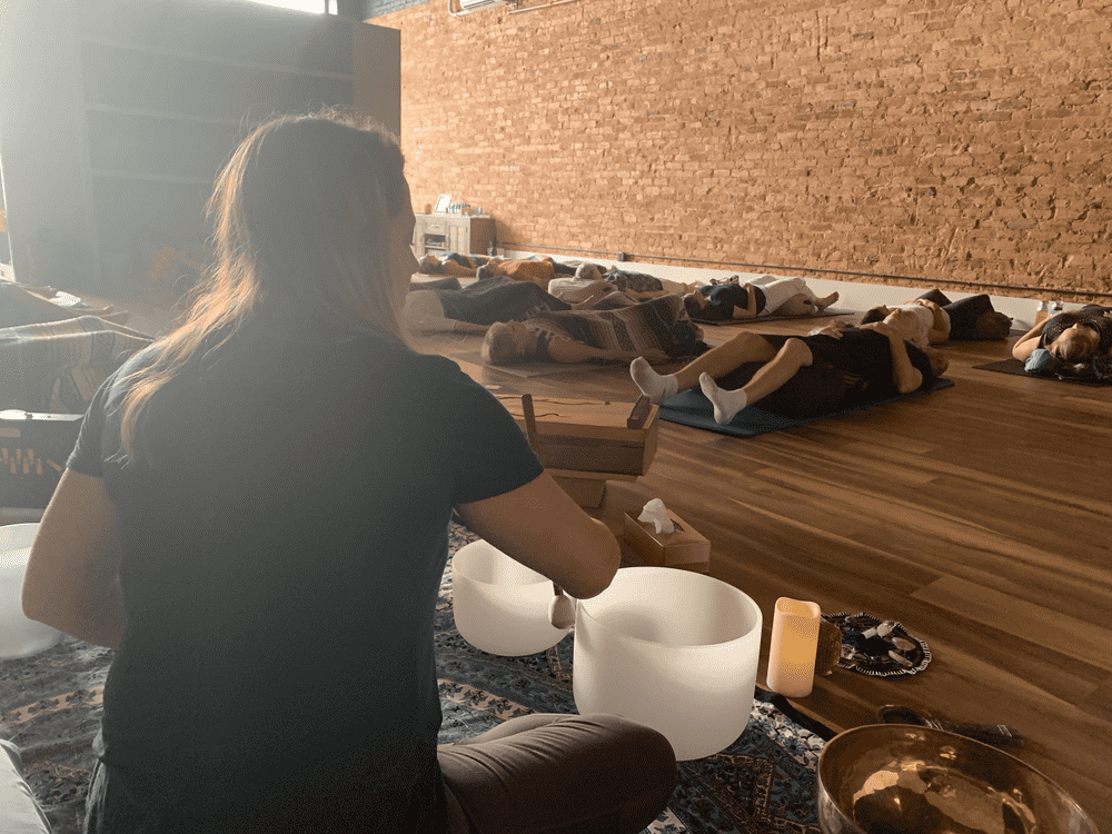 Katie Sutton leading a Zen Within Academy sound healing event