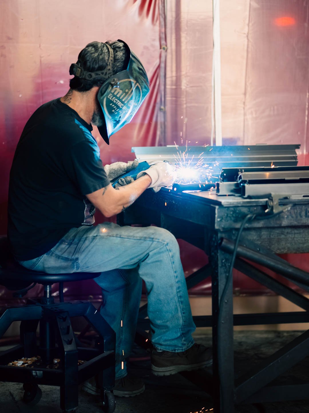 Macomb story manwelding far).jpg
