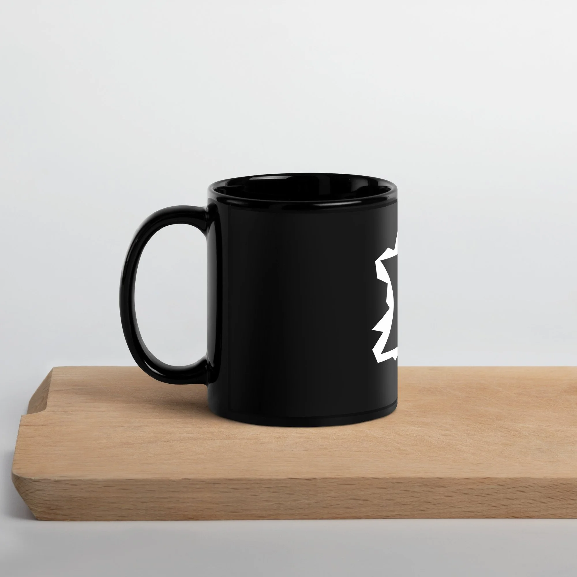 black-glossy-mug-black-11-oz-handle-on-left-65276d12b8ce4.jpg