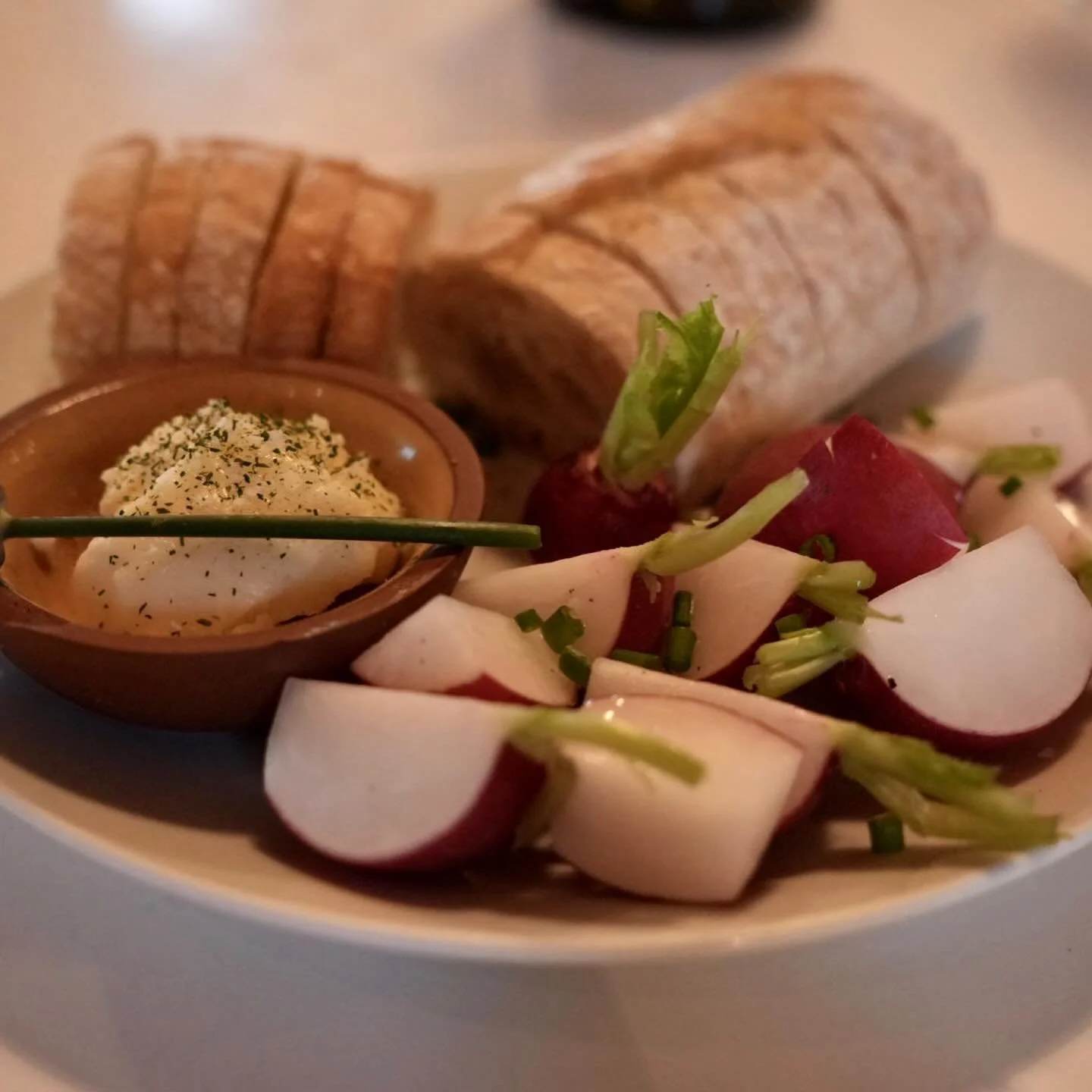 It&rsquo;s radish season&hellip; so the Radish &amp; Butter Plate is back on the menu! So fresh, and all local. 

Radishes from @plowbreakfarm (Hector) alongside NYS Butter from @kriemhilddairy, topped with Seneca Salt, ramp powder and chives. Served
