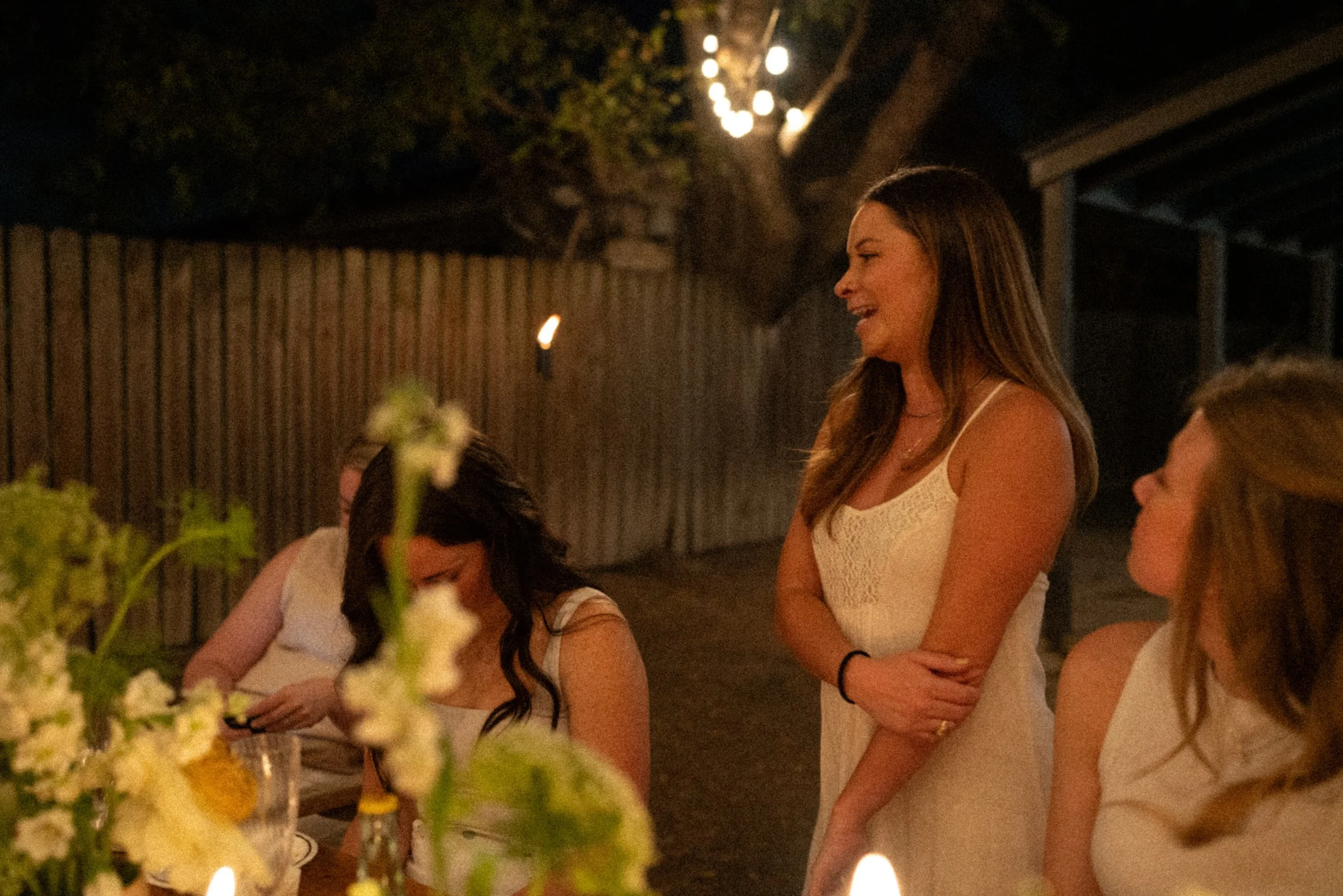 Austin wedding photographer capturing heartfelt speeches at engagement party