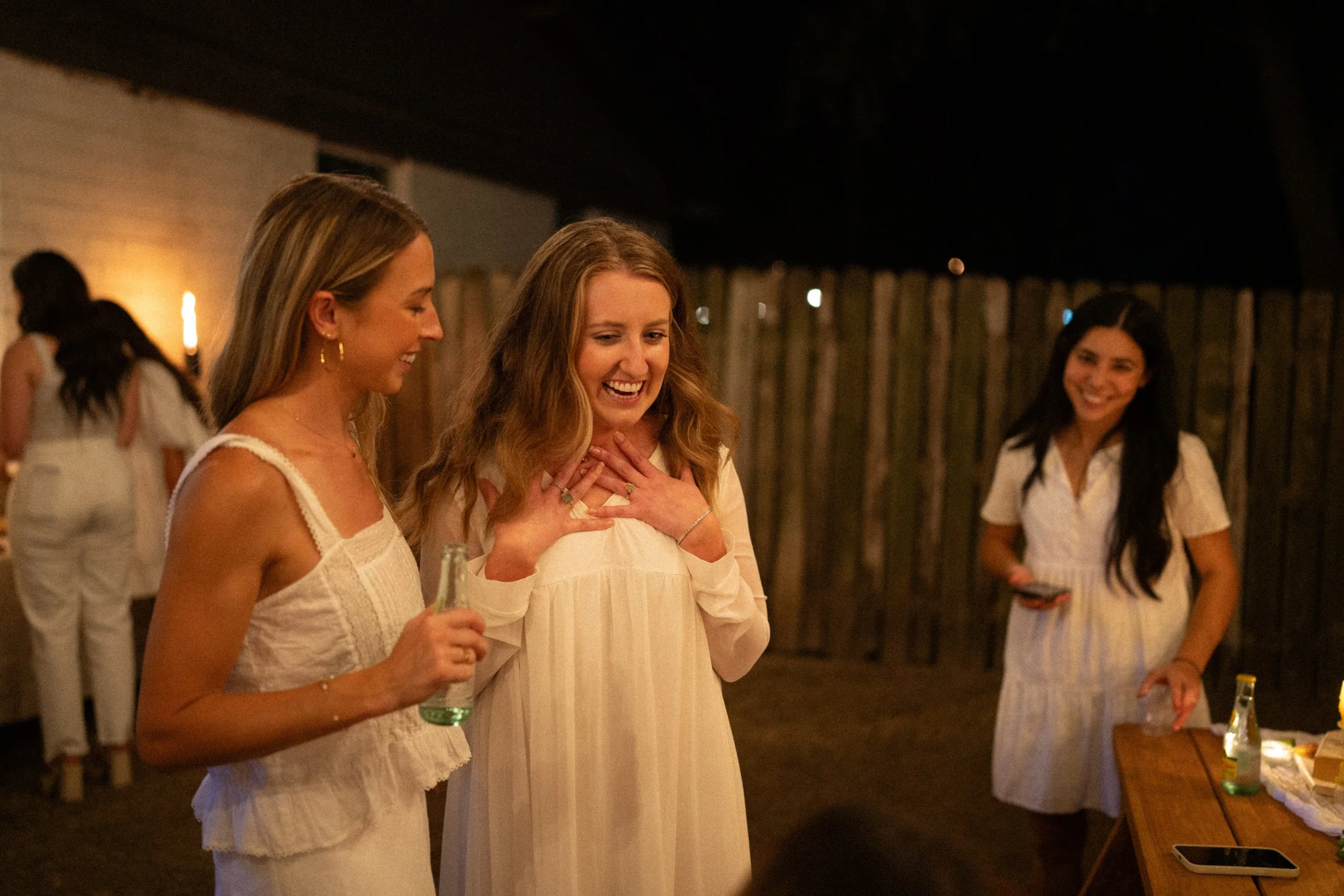 Joyful candid photos of Austin engagement celebration with friends
