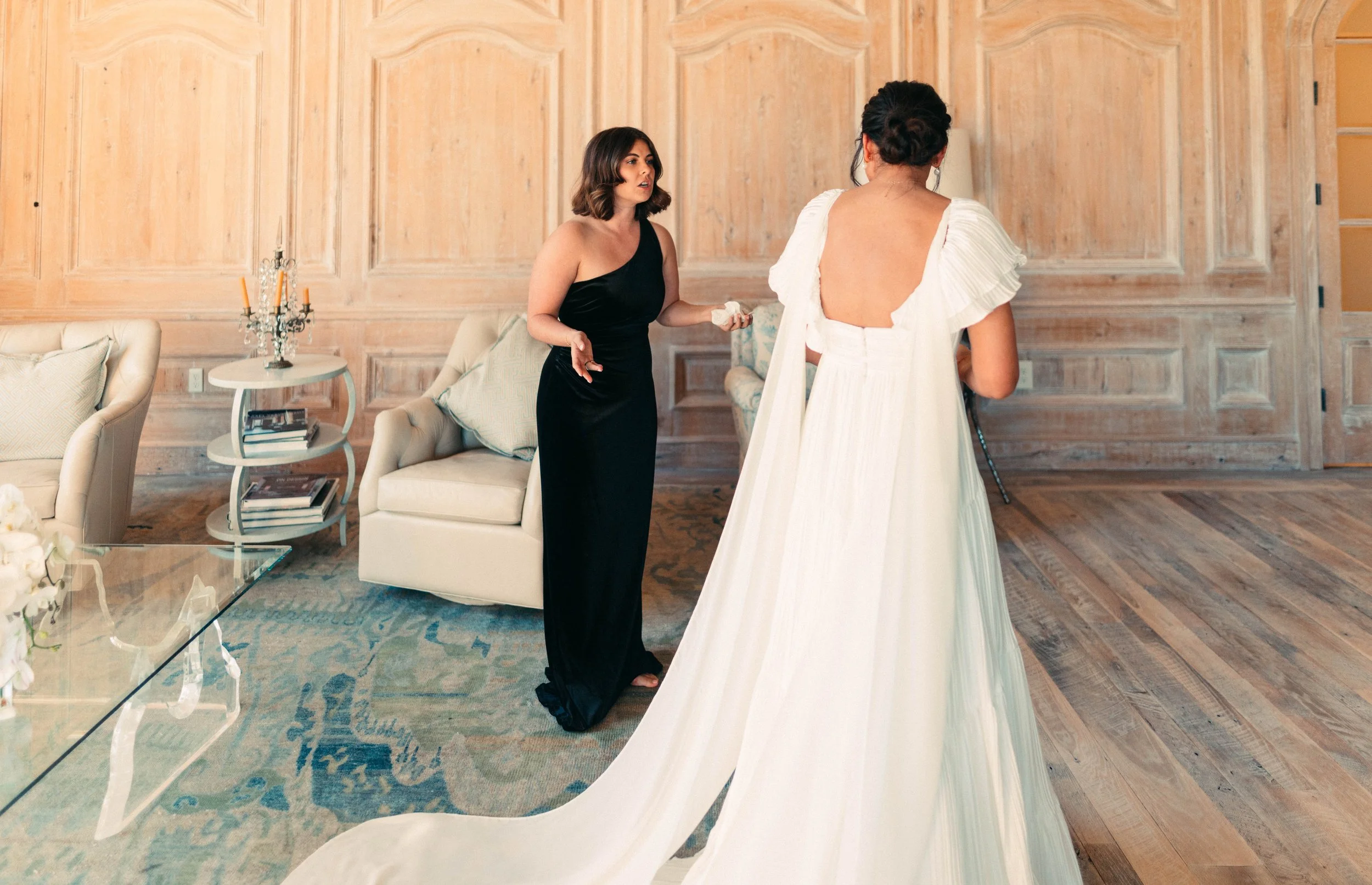 Bride sharing an emotional first look with her bridesmaids at Houston Oaks | documentary Austin travel wedding photographer.