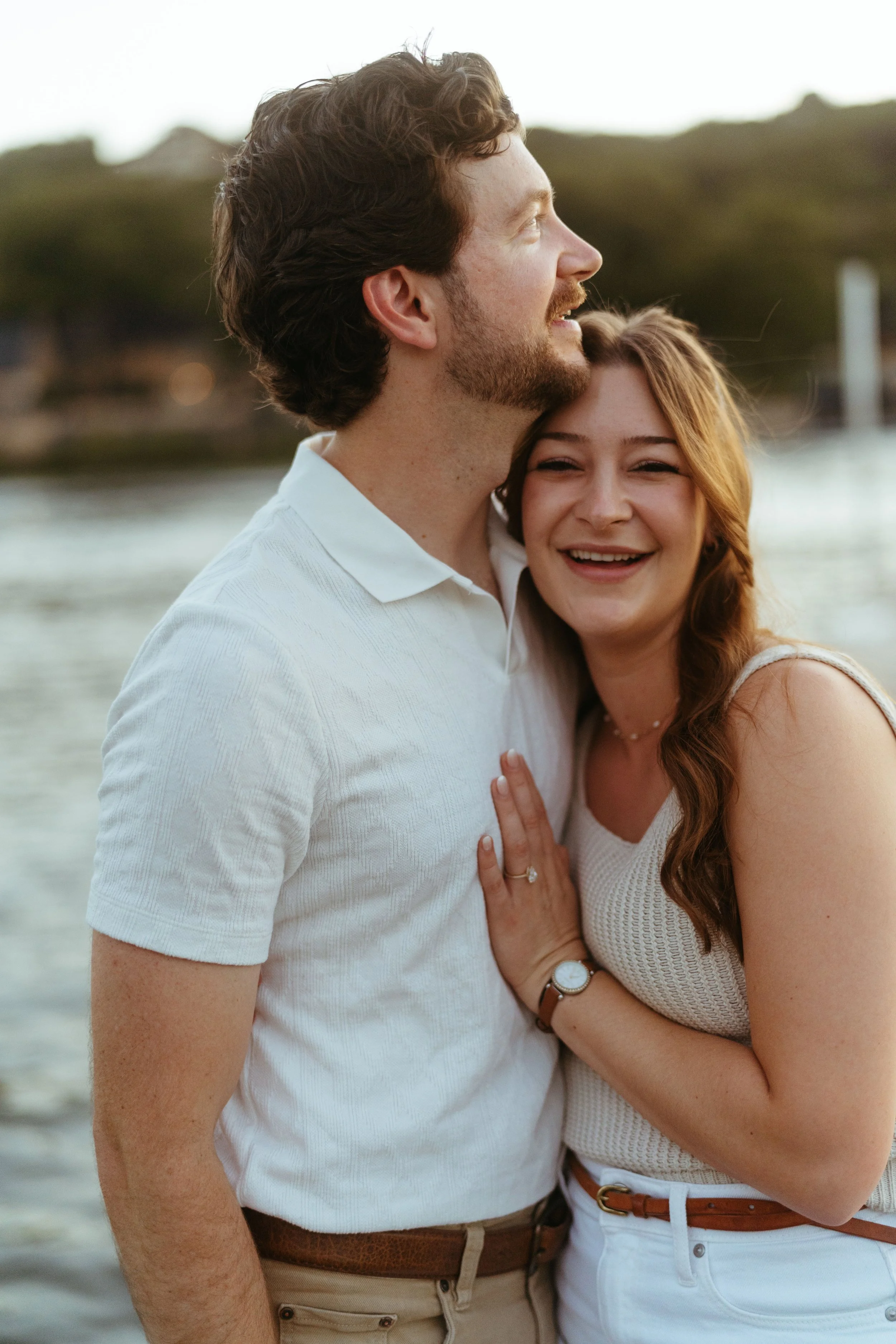 Romantic engagement photography in Austin Texas with couple at the lake