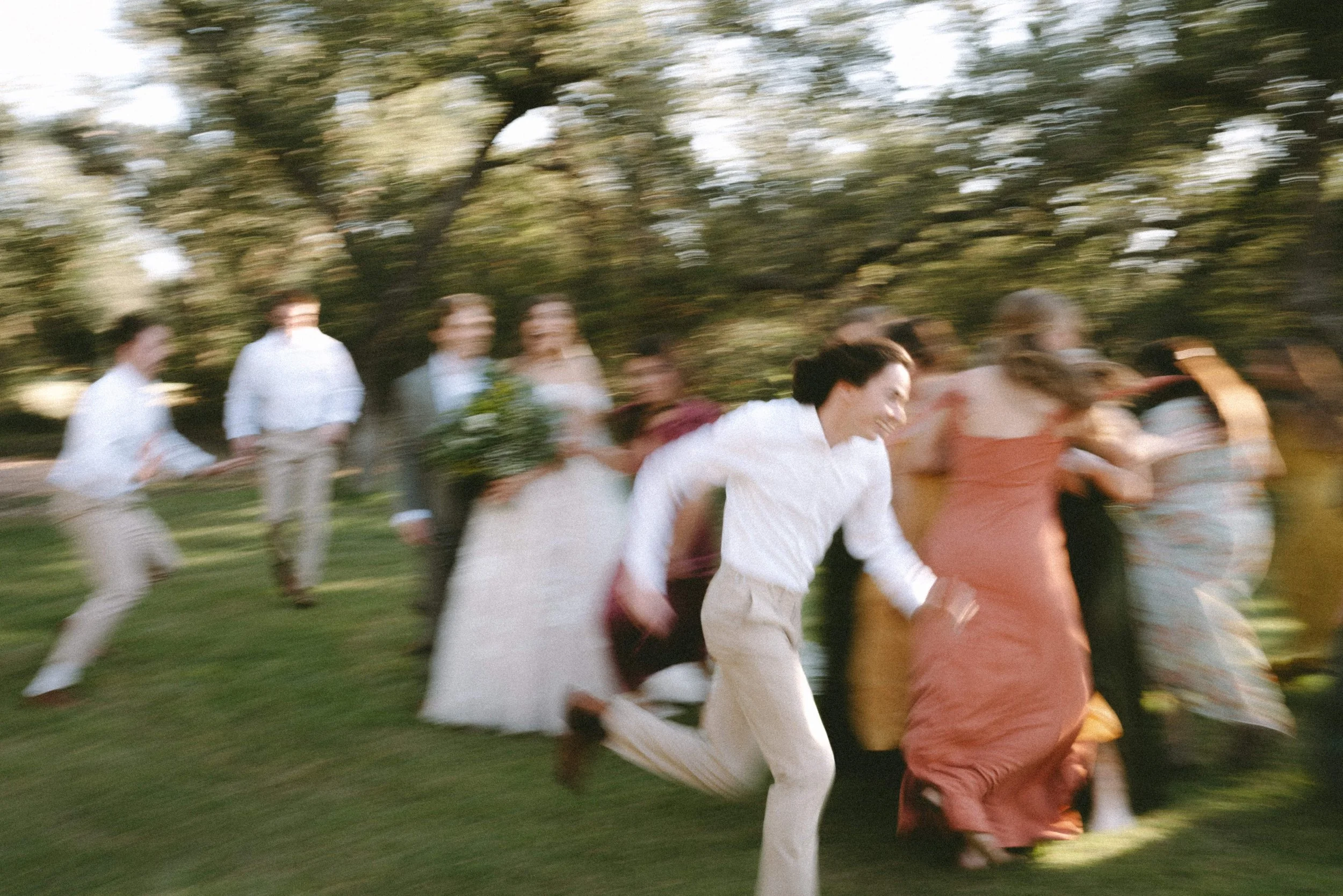 Groomsman sprinting – Unscripted Austin Wedding Moment