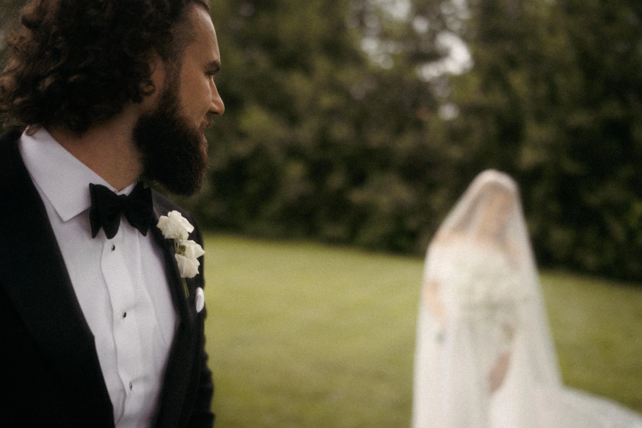 romantic first look wedding photo in Texas garden venue