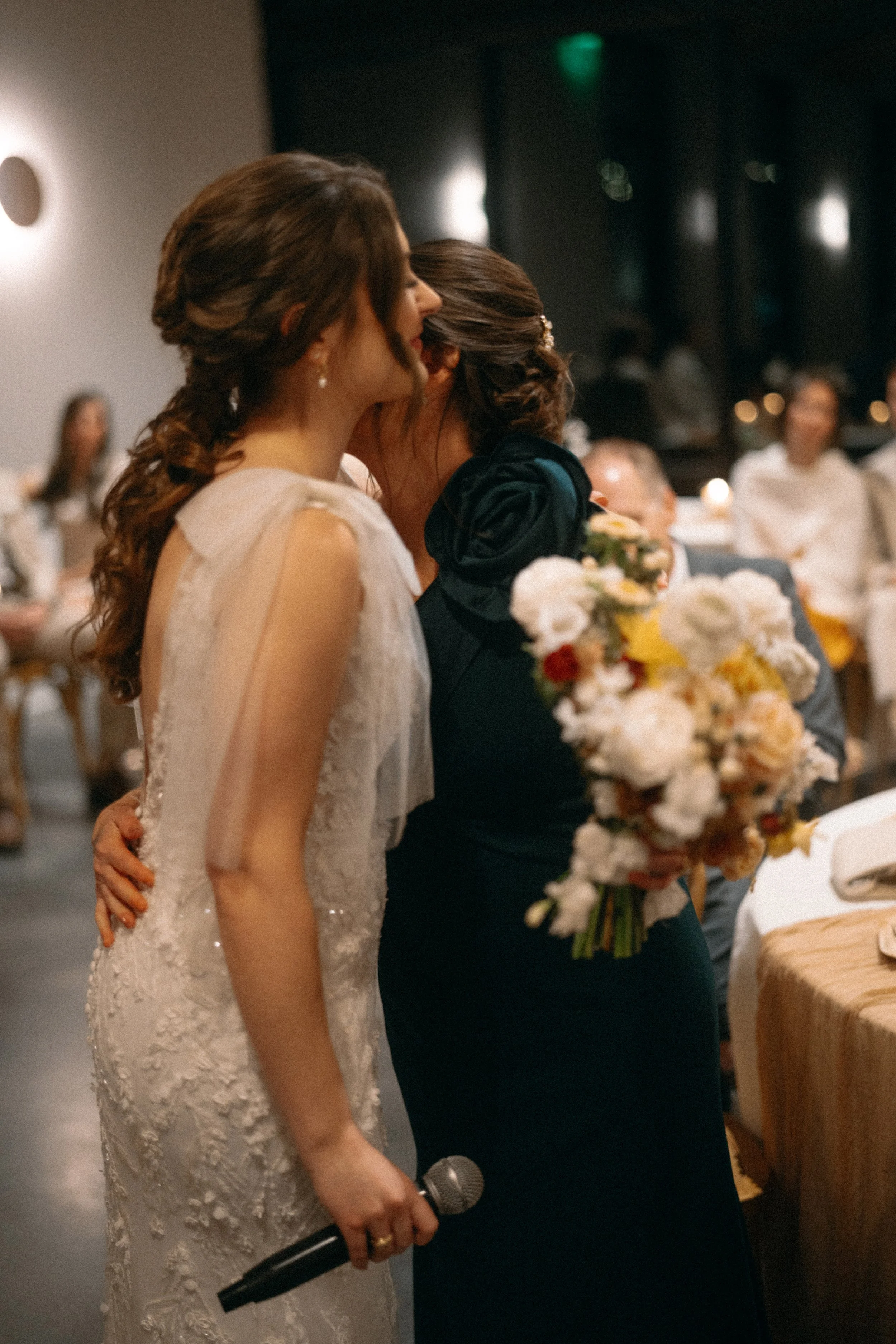 Bride dedicates bouquet to her mother during wedding reception at The Grand Lady Manor TX