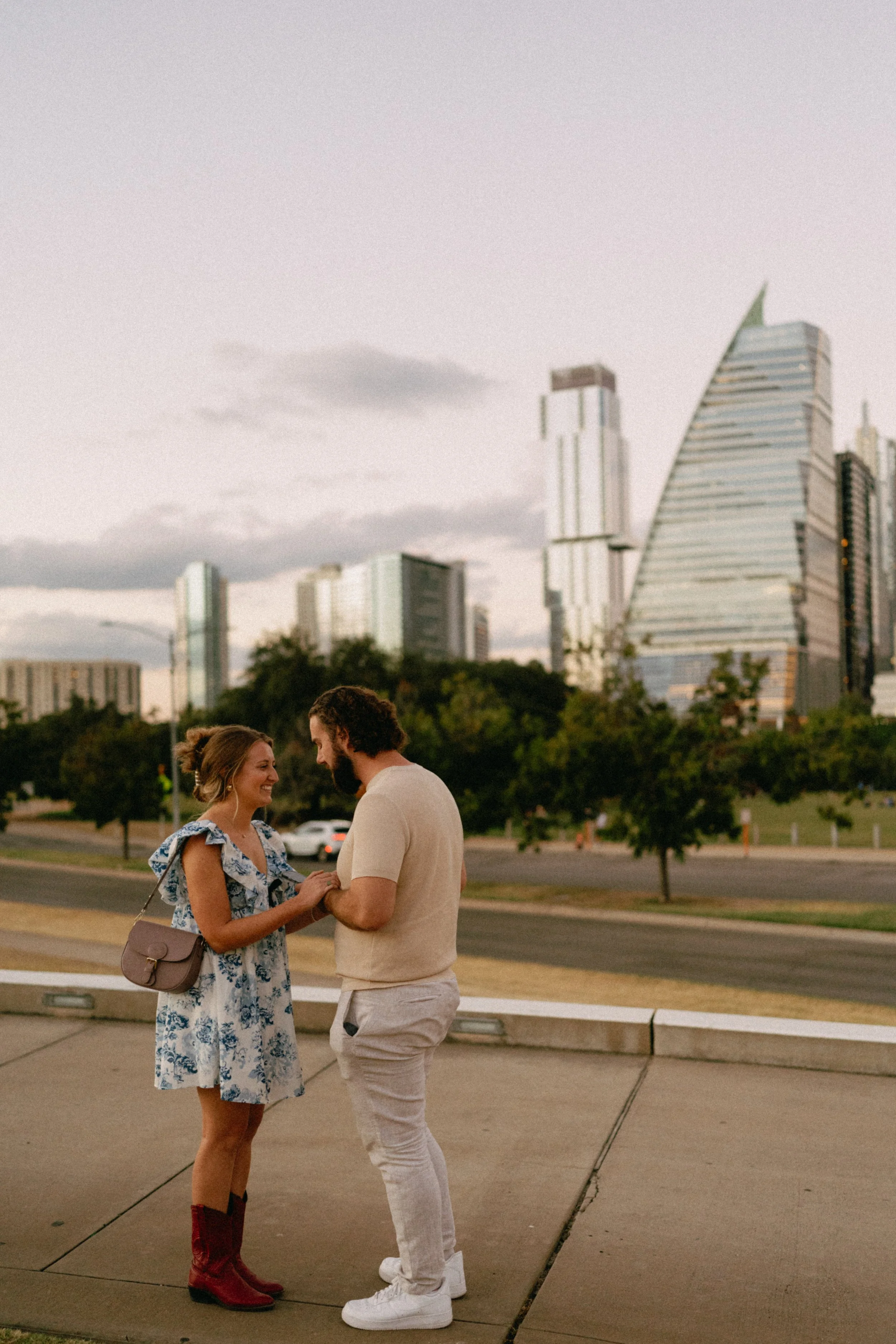 Austin wedding photographer capturing candid proposal moment in downtown