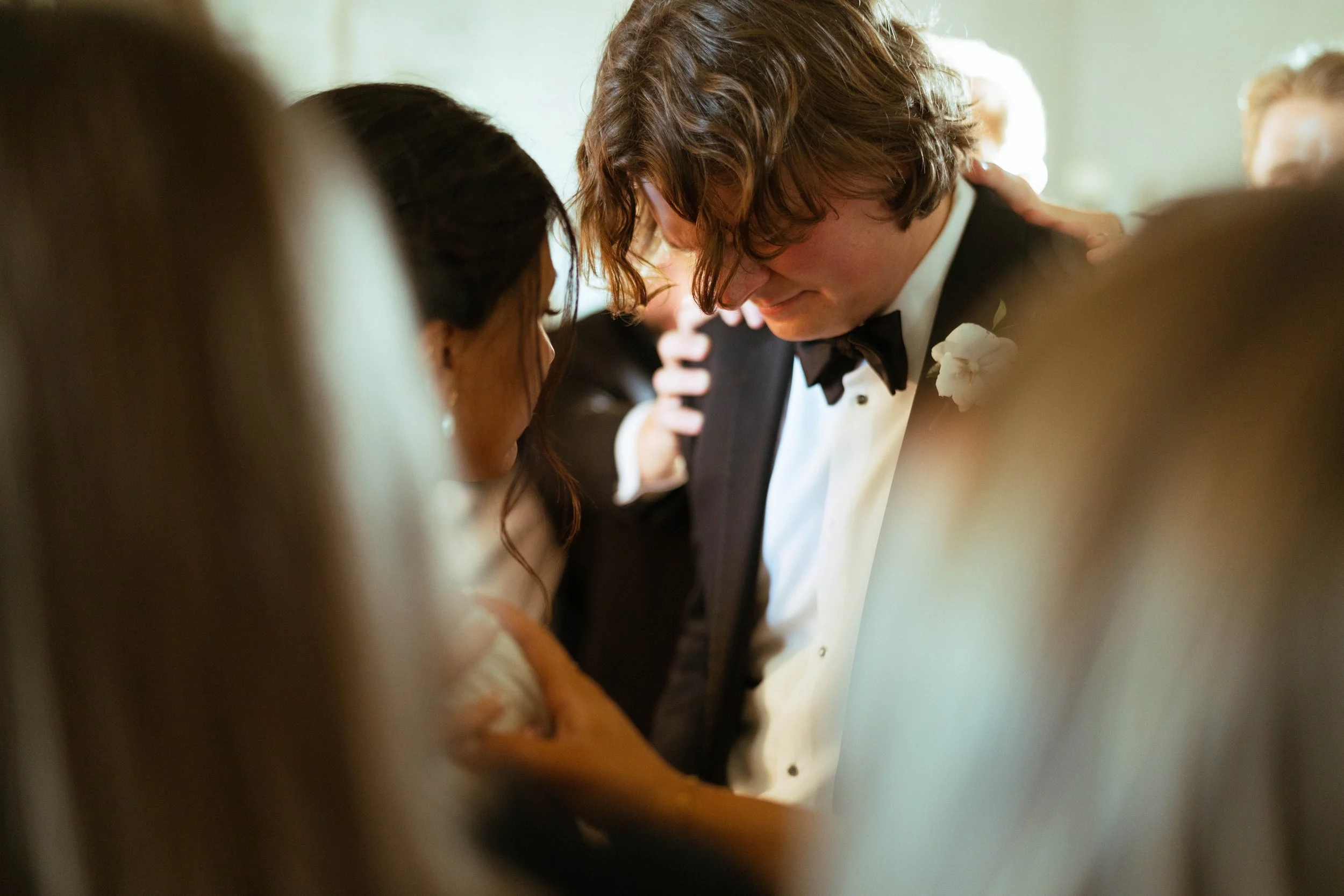 Communion shared by bride, groom, and wedding party | candid Austin wedding photography in Houston.