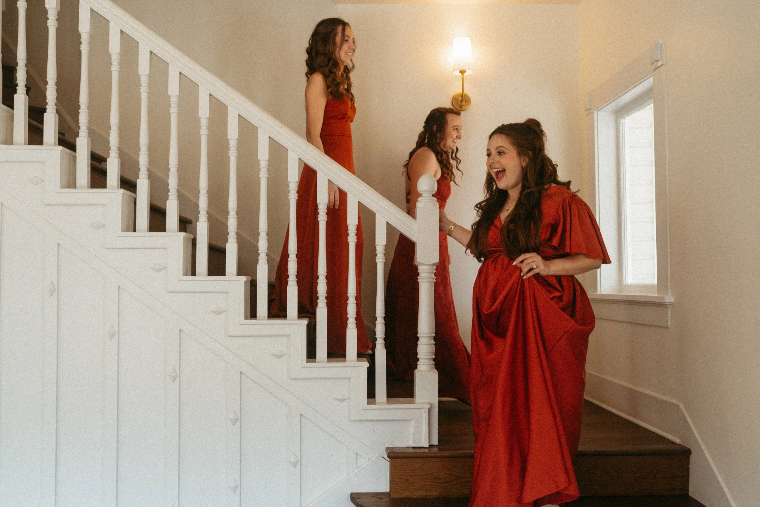 candid of the first look between the bride and her bridesmaids at The Grand Lady in manor tx just outside of austin