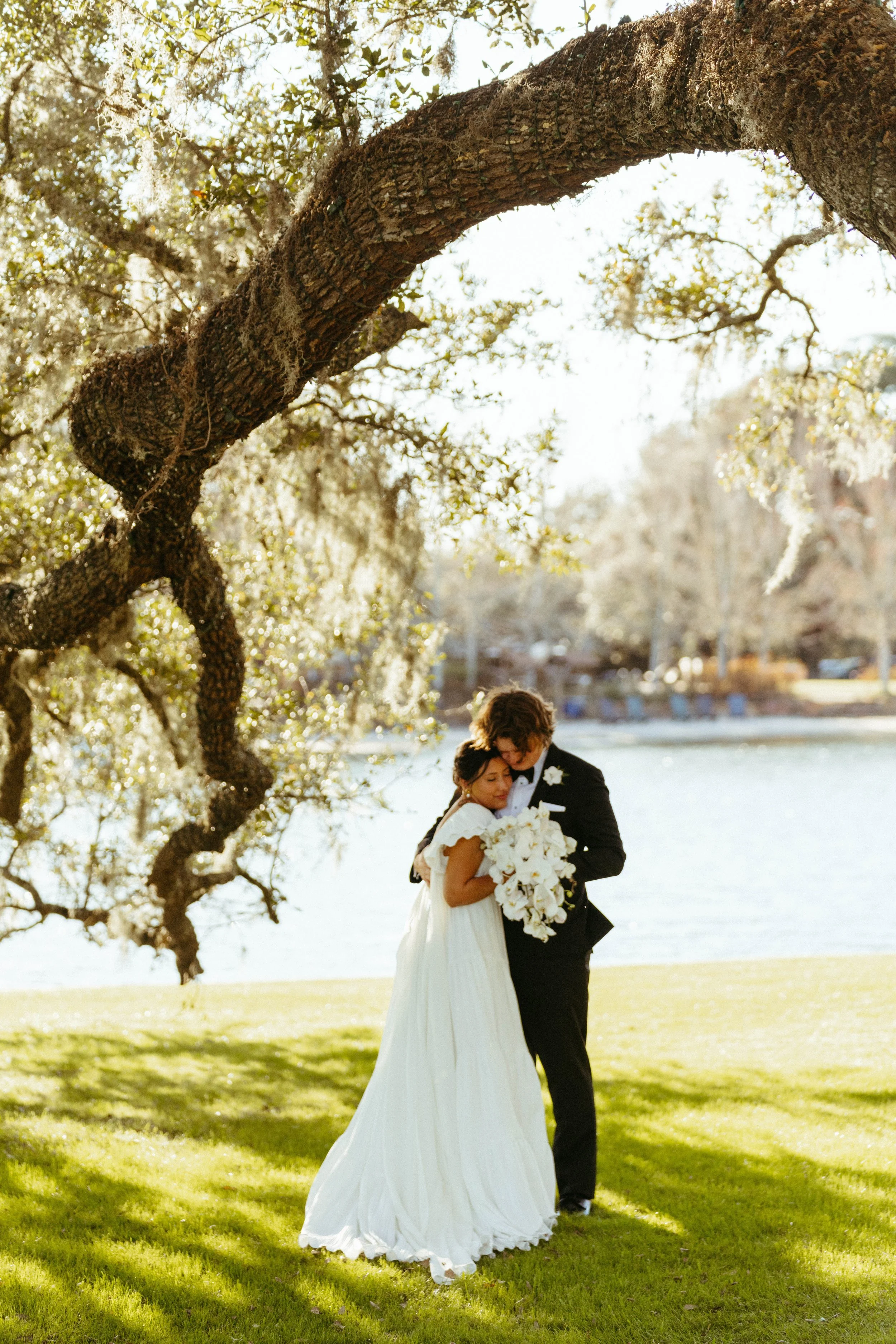 Documentary style portraits of bride and groom at Houston Oaks.