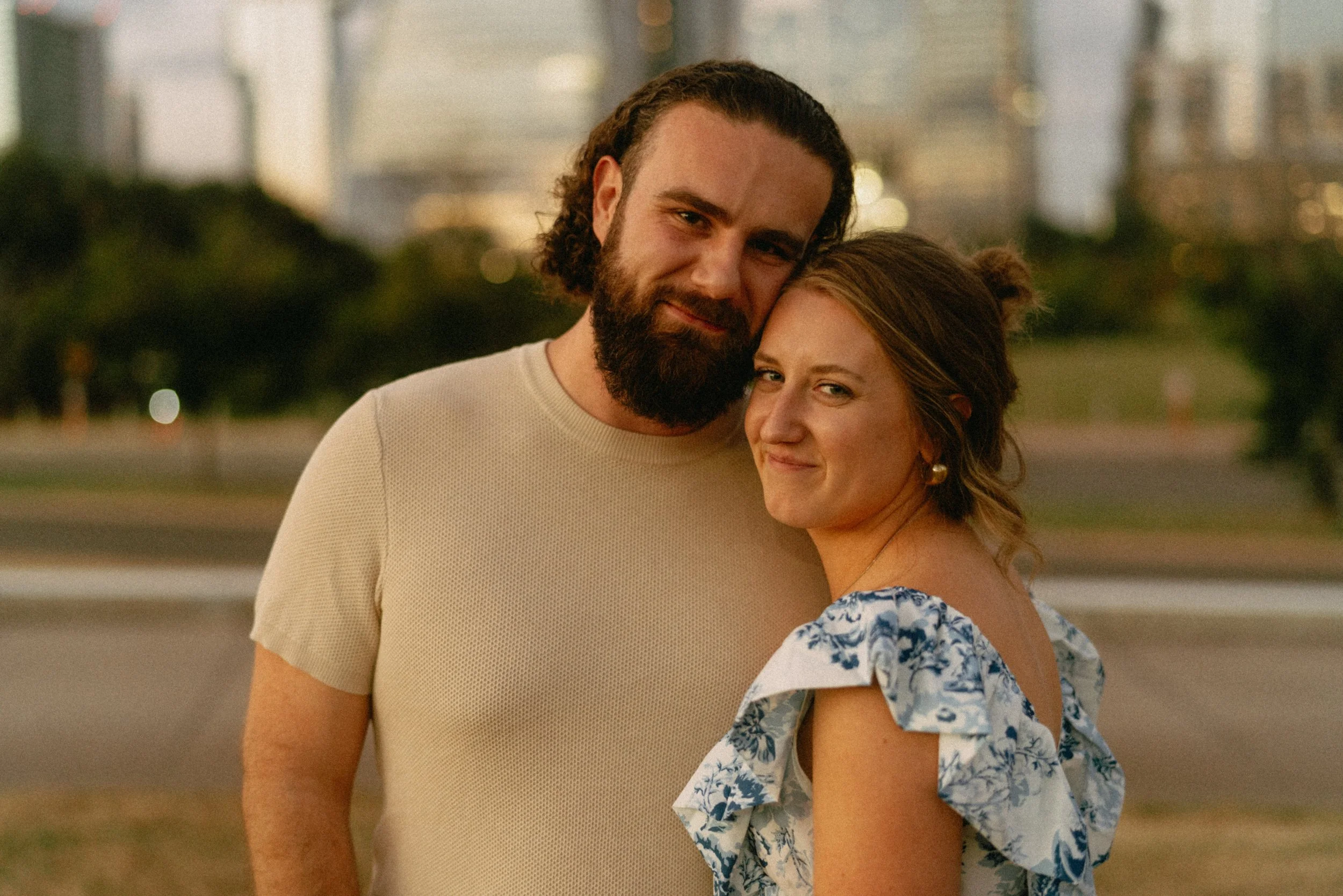 Bride-to-be surprised during proposal at Auditorium Shores with Austin skyline