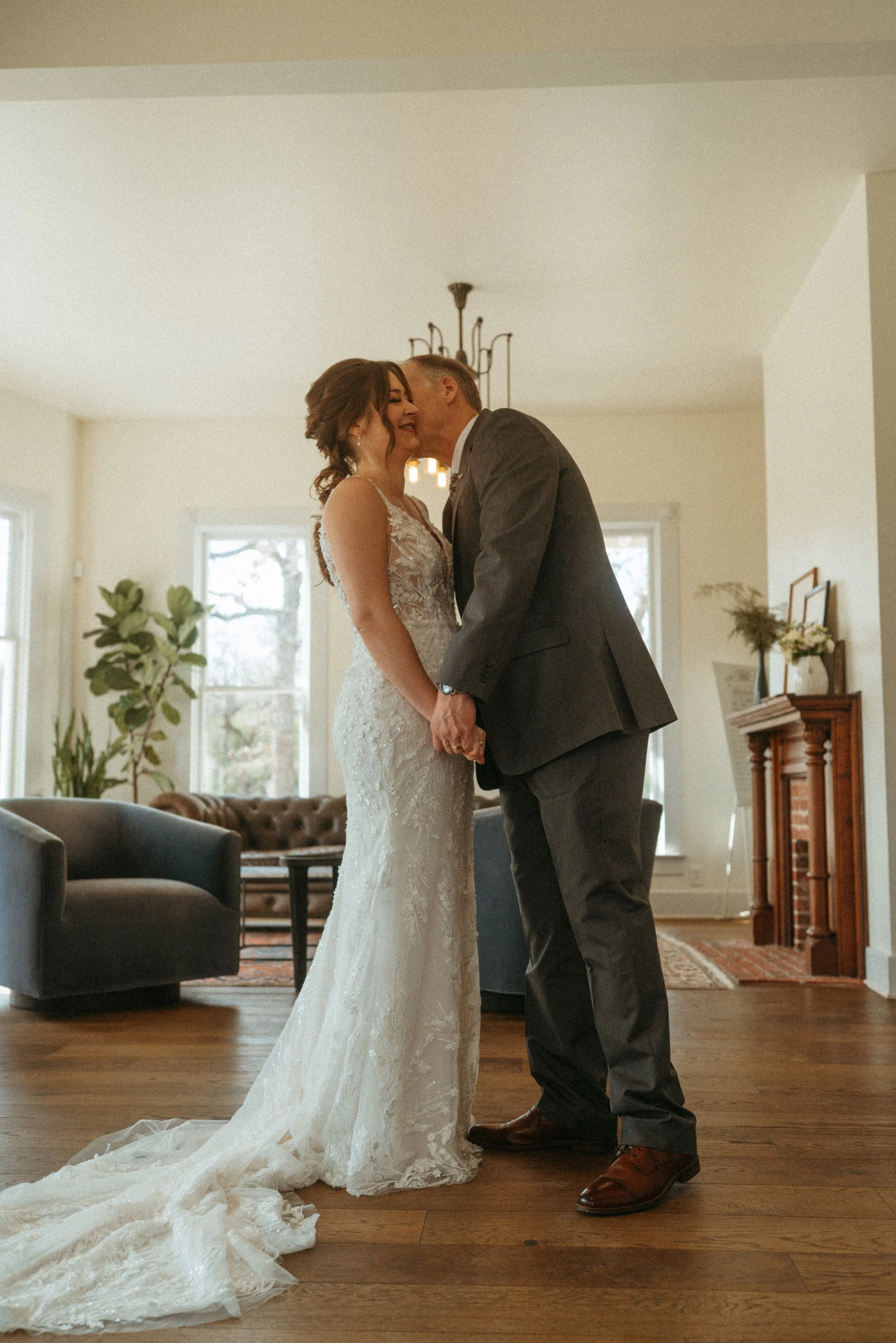 candid of the first look between the bride and the father of the bride at The Grand Lady in manor tx just outside of austin