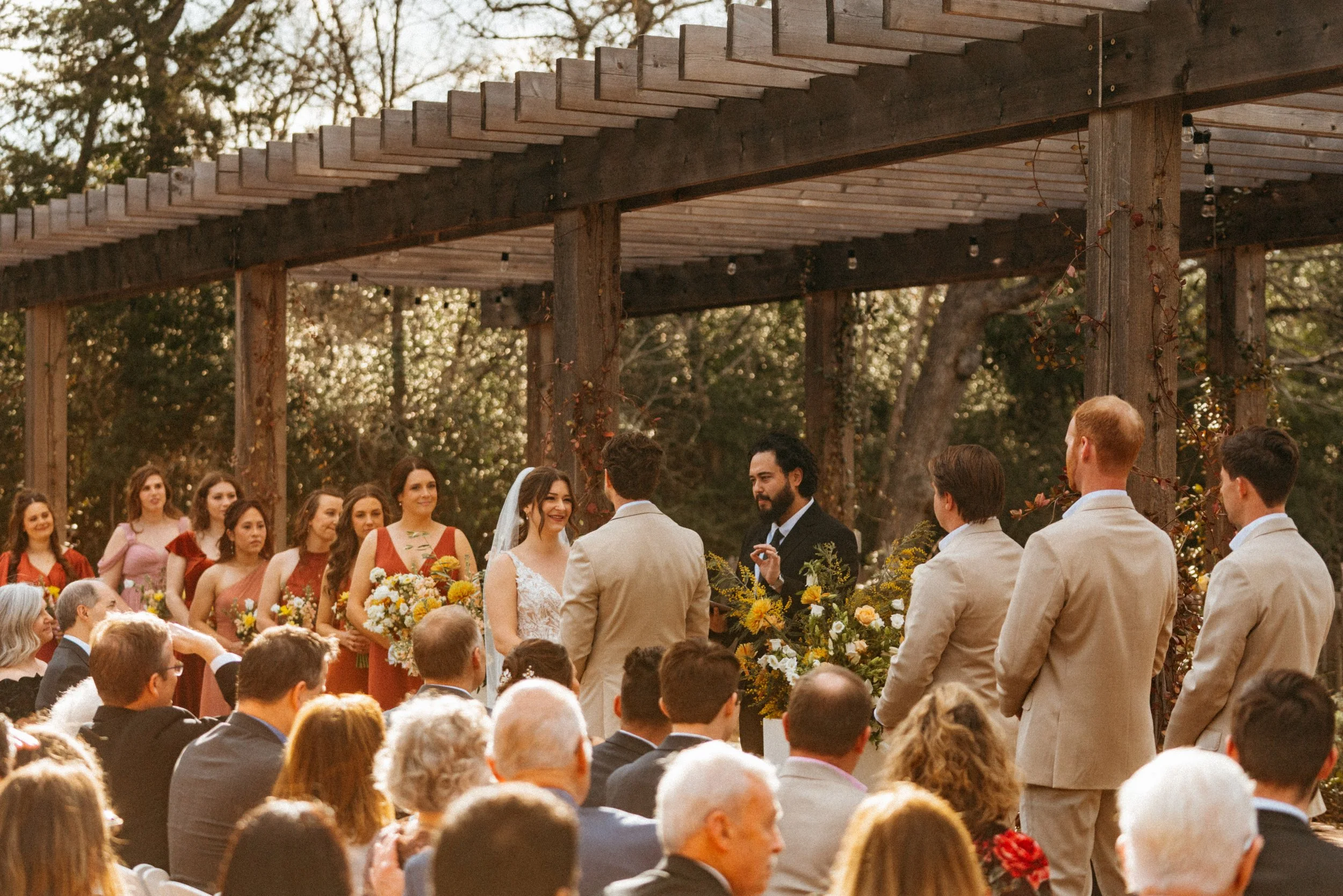 Sunset ceremony in the Grand Lady Florals flower garden at The Grand Lady in Manor, TX