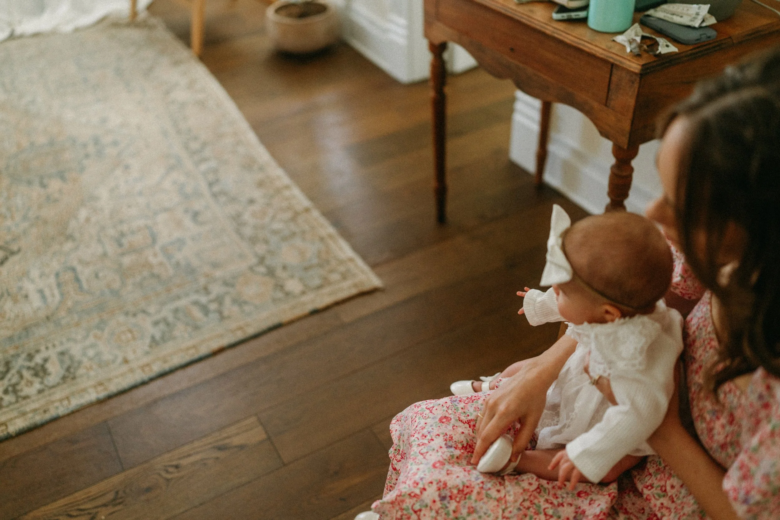 Bridesmaid with wedding baby at The Grand Lady in manor tx just outside of austin