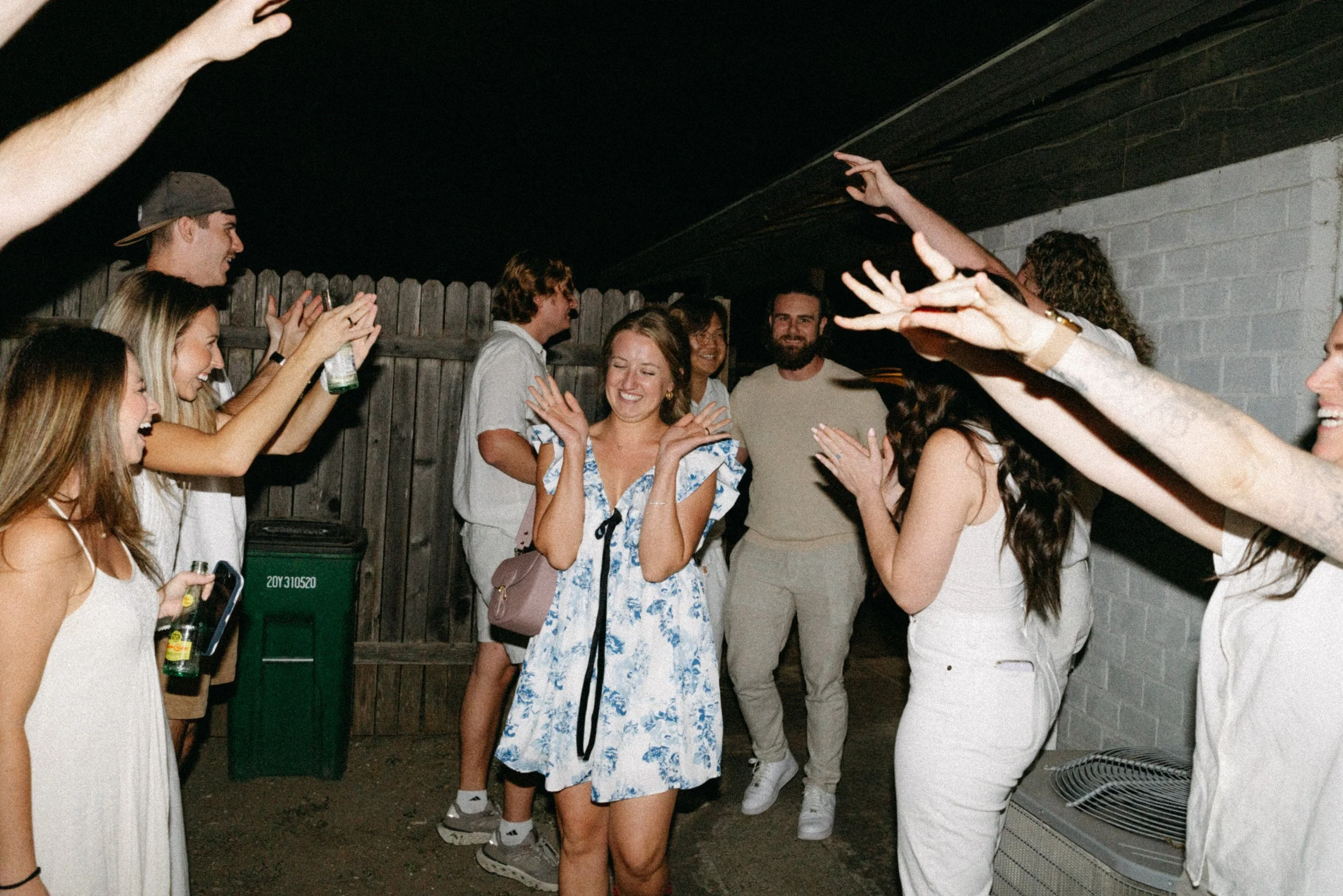 Bride-to-be celebrating with friends and family after proposal in Austin
