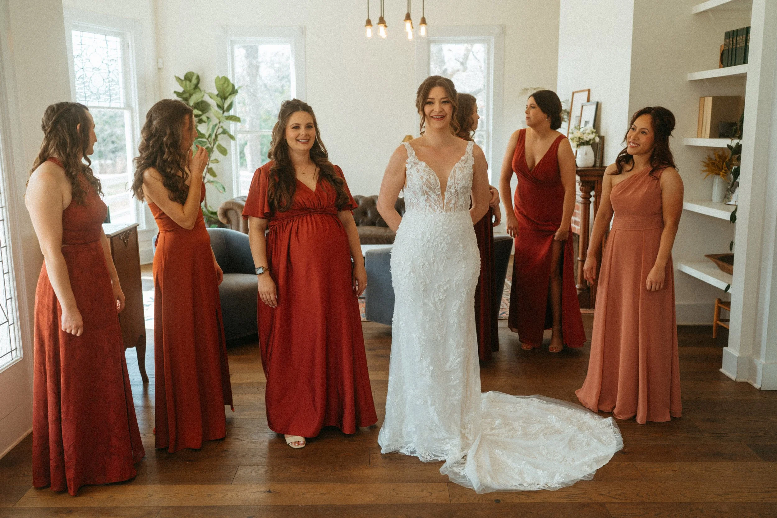 documentary style wedding photography candid of the first look between the bride and her bridesmaids at The Grand Lady in manor tx just outside of austin
