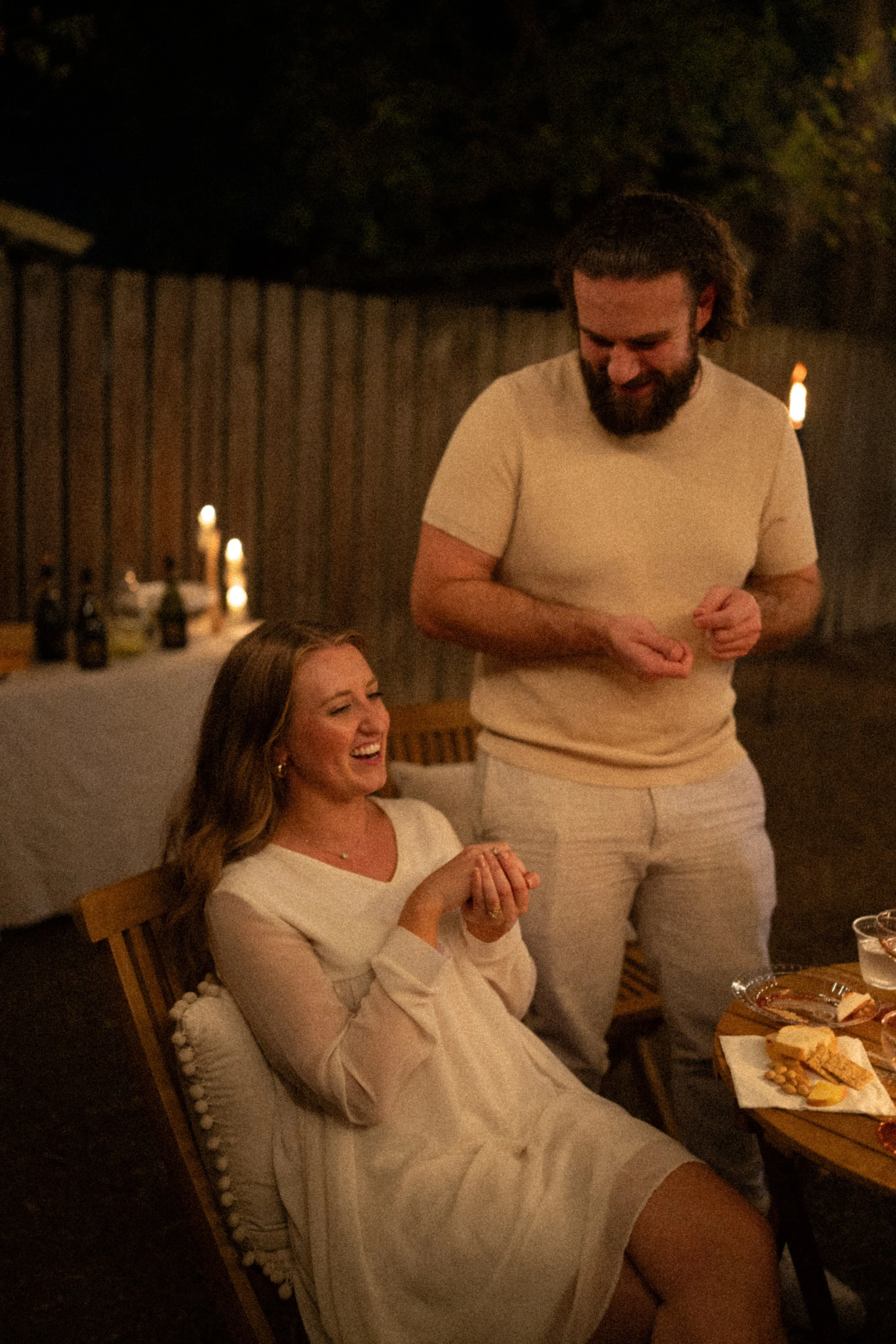 Austin wedding photographer capturing heartfelt speeches at engagement party