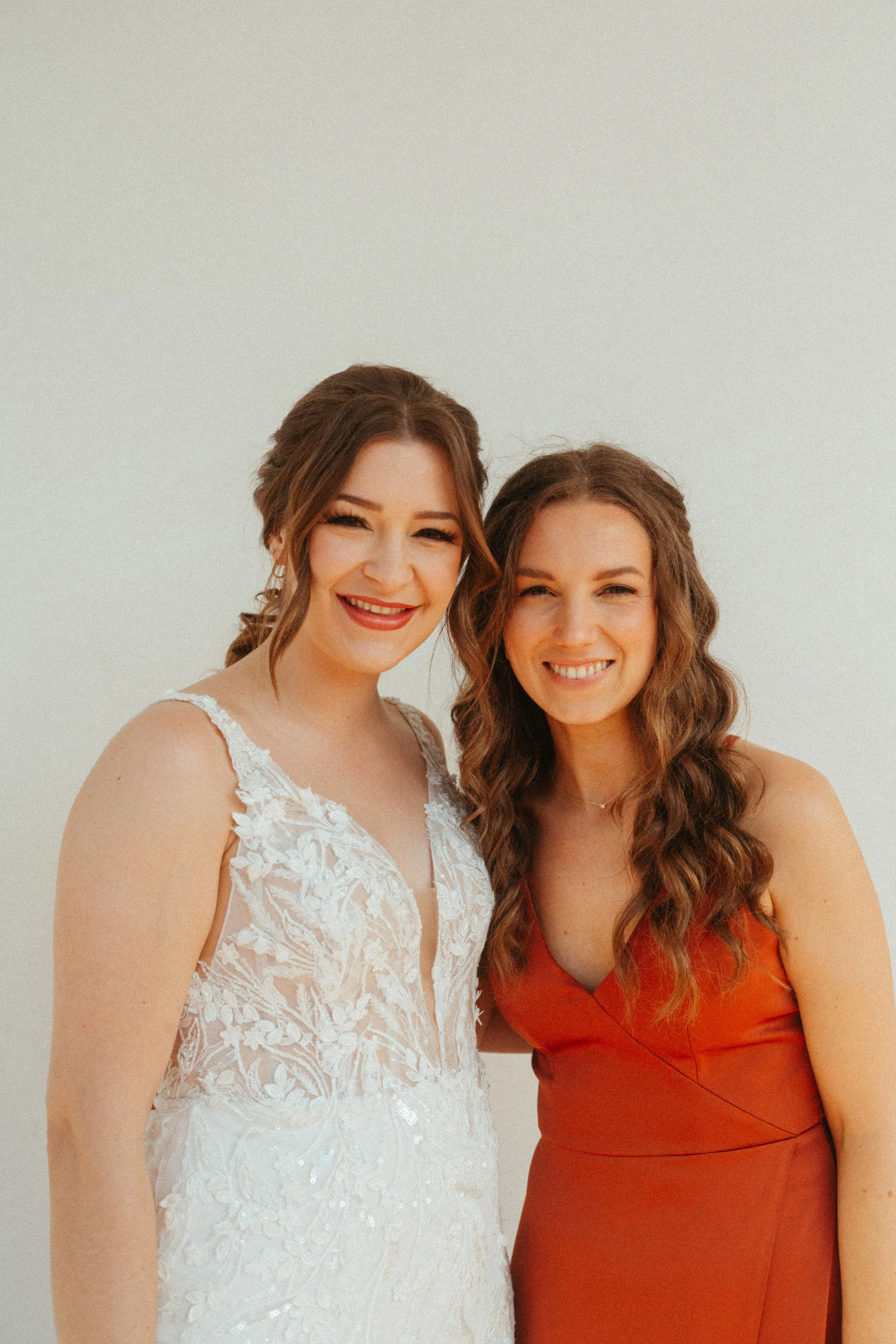 Bridesmaids in beautiful red bridesmaids dresses at The Grand Lady Austin wedding
