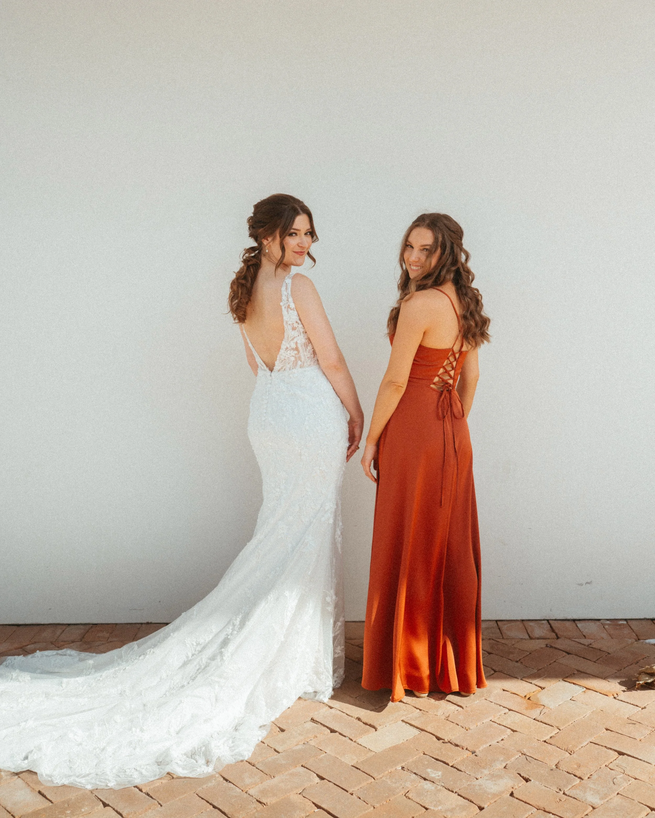 Bridesmaids in beautiful red bridesmaids dresses at The Grand Lady Austin wedding