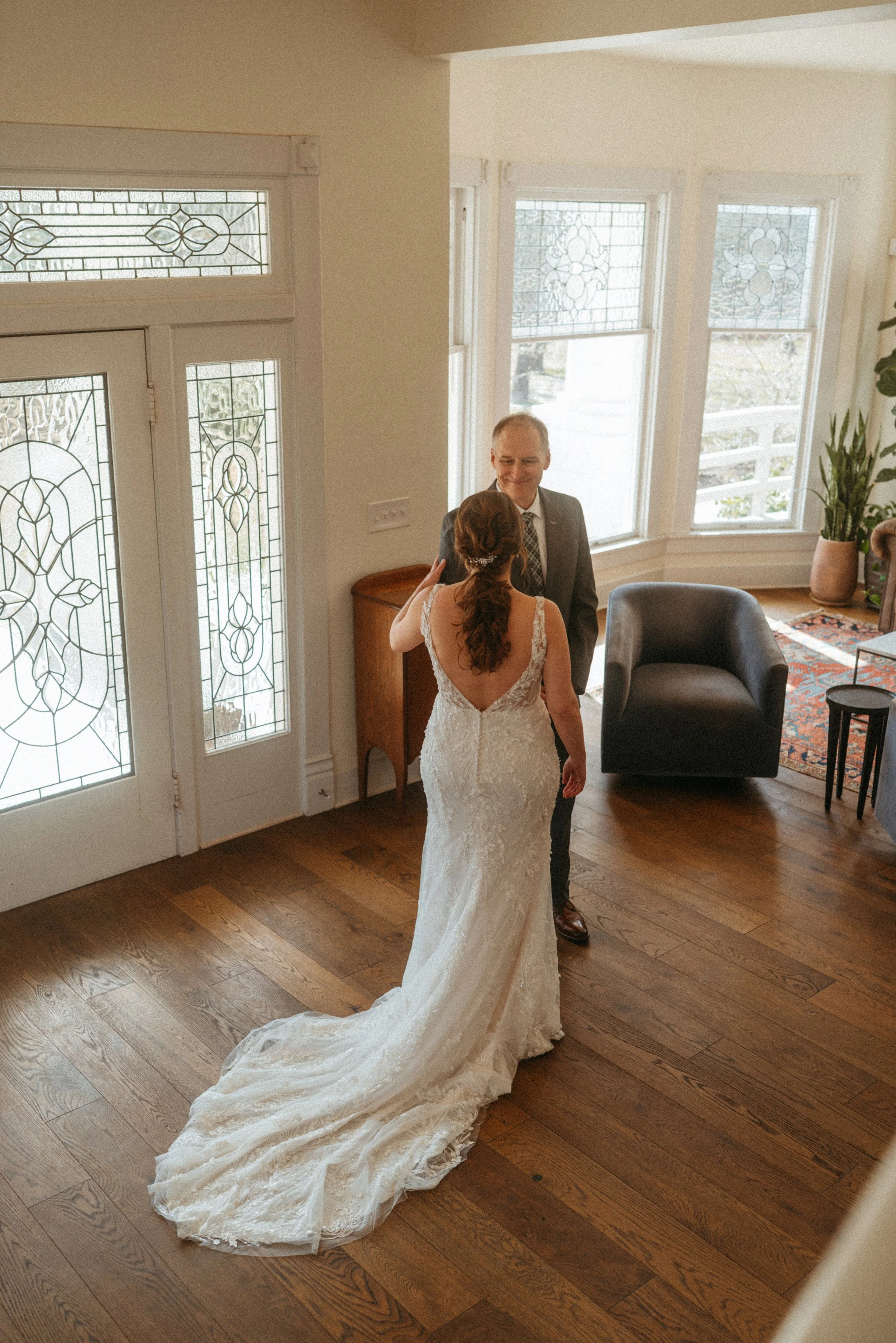 candid of the first look between the bride and the father of the bride at The Grand Lady in manor tx just outside of austin