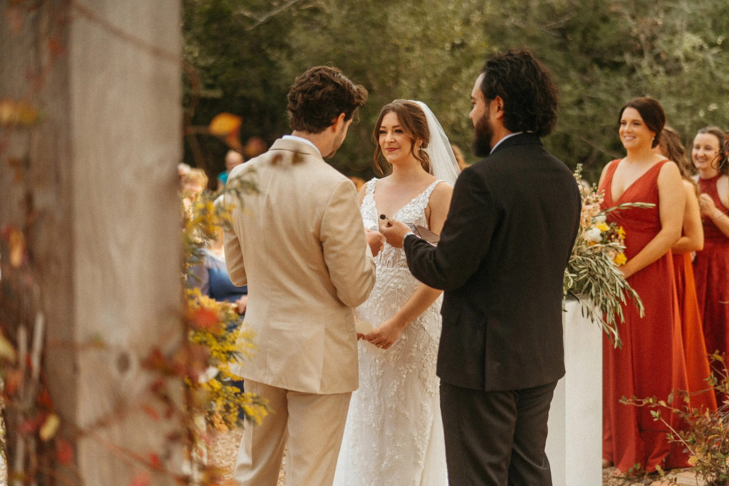 Wedding vows exchanged beneath oak trees at The Grand Lady Austin