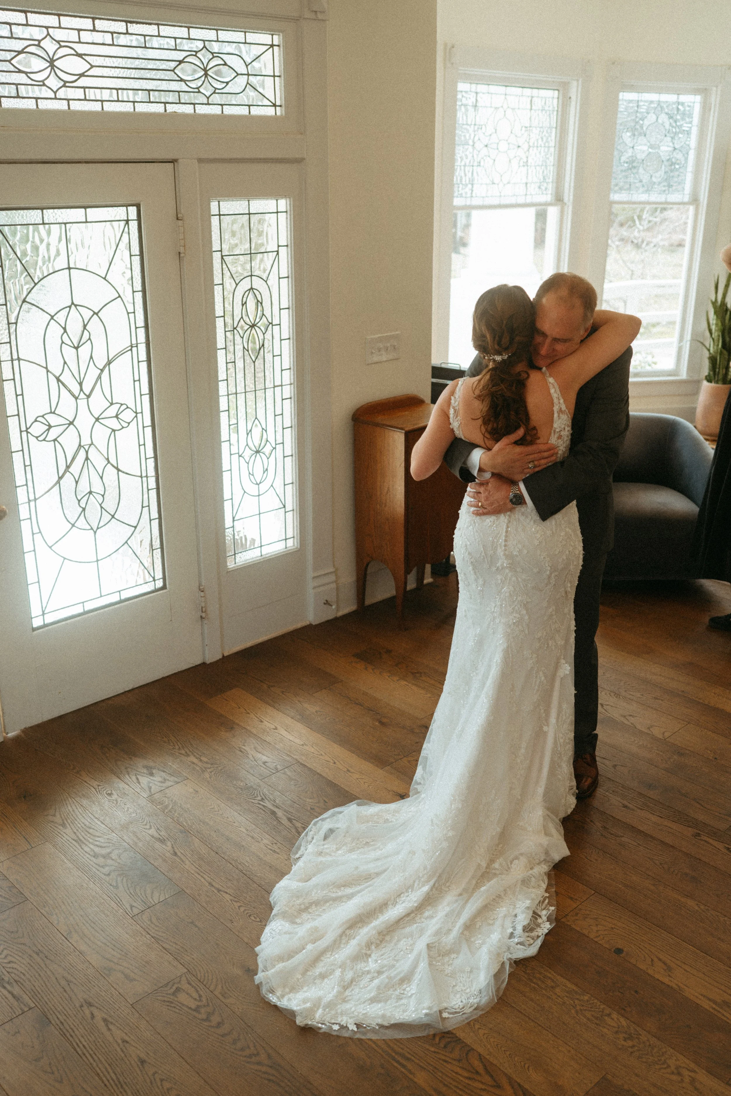 candid of the first look between the bride and the father of the bride at The Grand Lady in manor tx just outside of austin