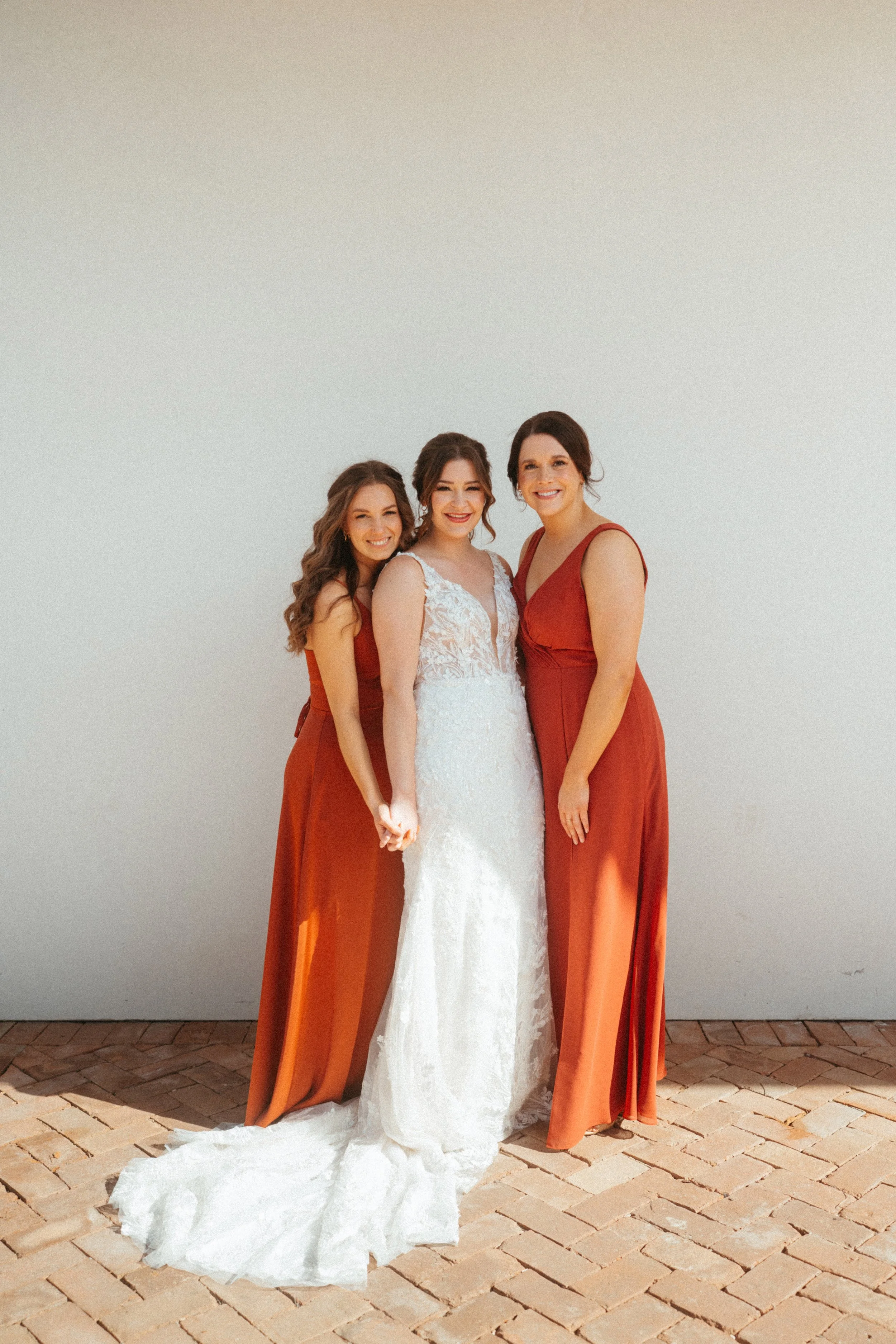 Bridesmaids in beautiful red bridesmaids dresses at The Grand Lady Austin wedding