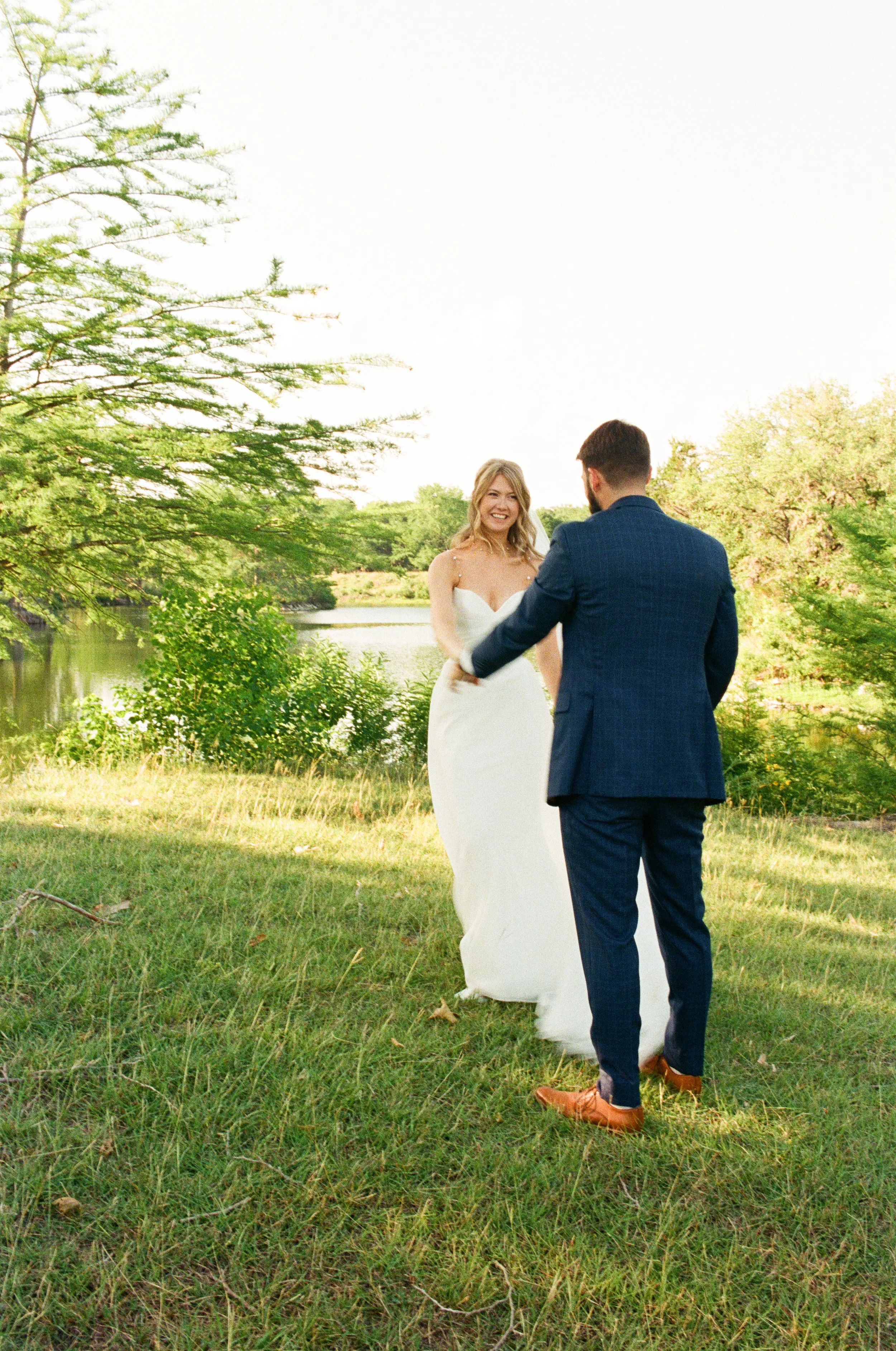 Bride and groom private first dance lakeside at Canyon Lake Texas wedding venue