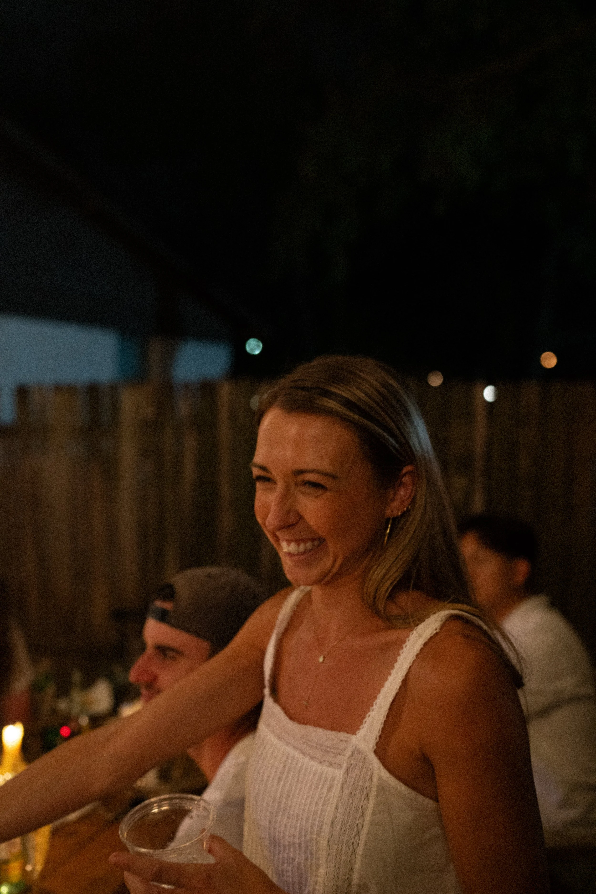 Austin wedding photographer capturing heartfelt speeches at engagement party