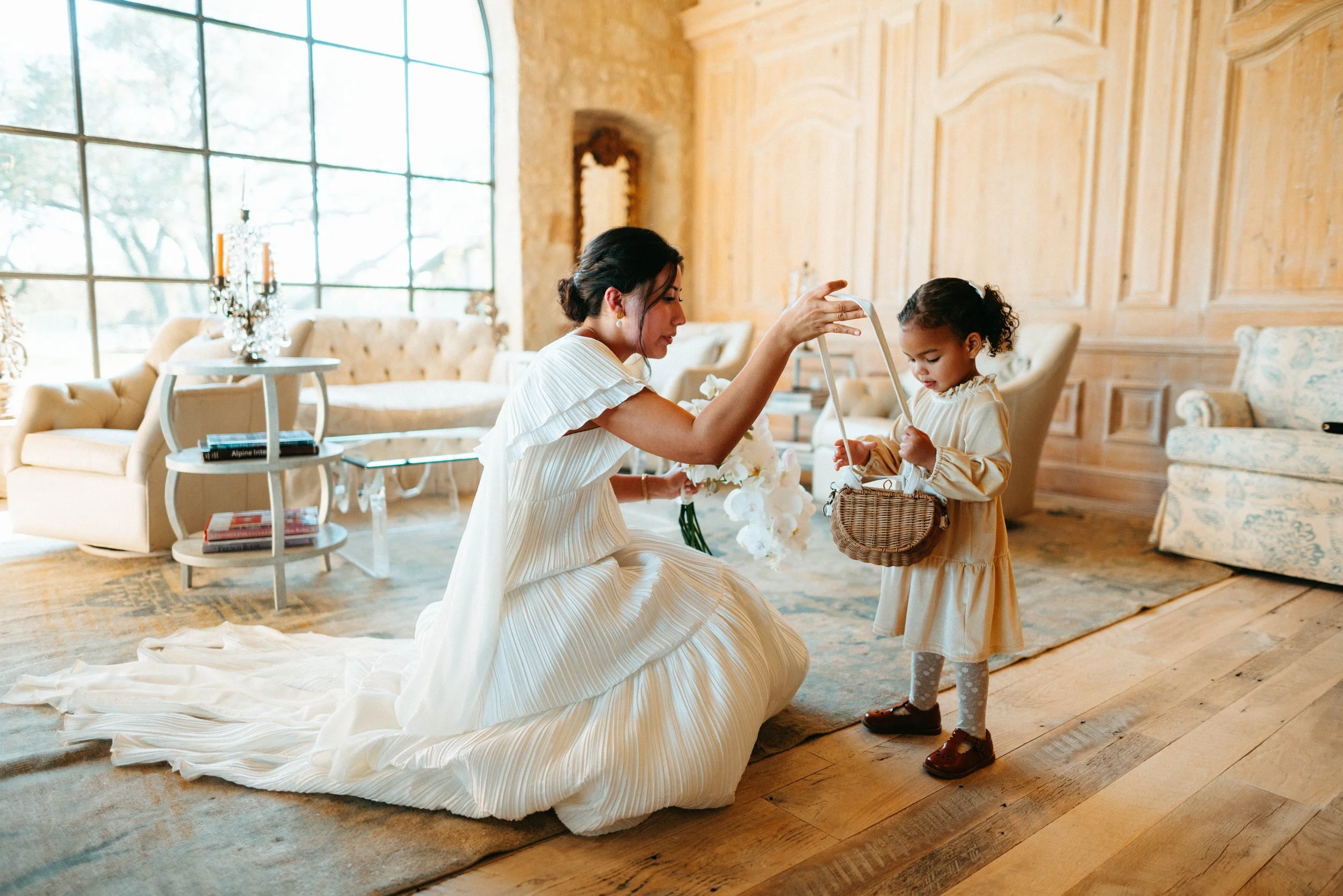 Bride sharing an emotional first look with her bridesmaids at Houston Oaks | documentary Austin travel wedding photographer.