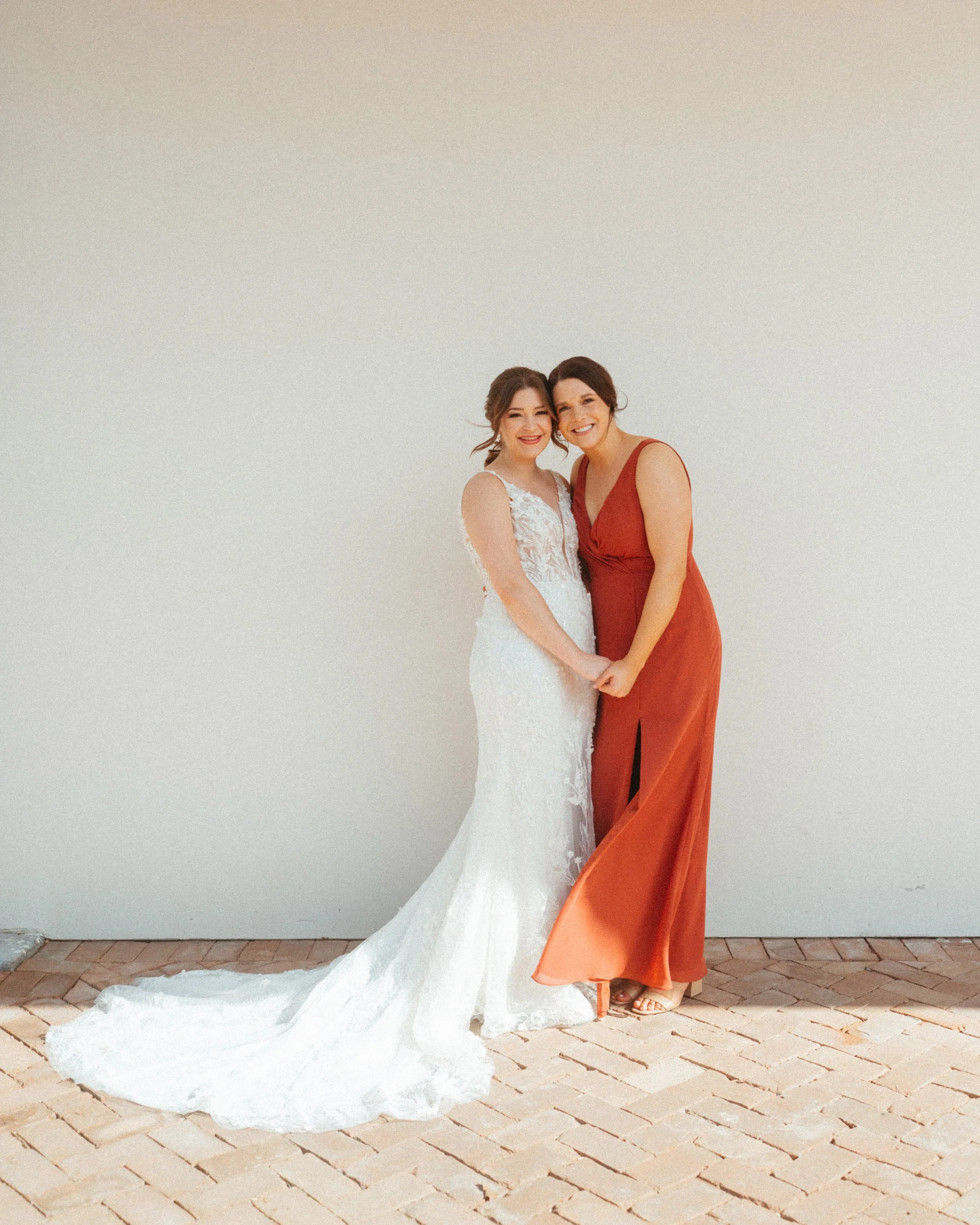 Bridesmaids in beautiful red bridesmaids dresses at The Grand Lady Austin wedding