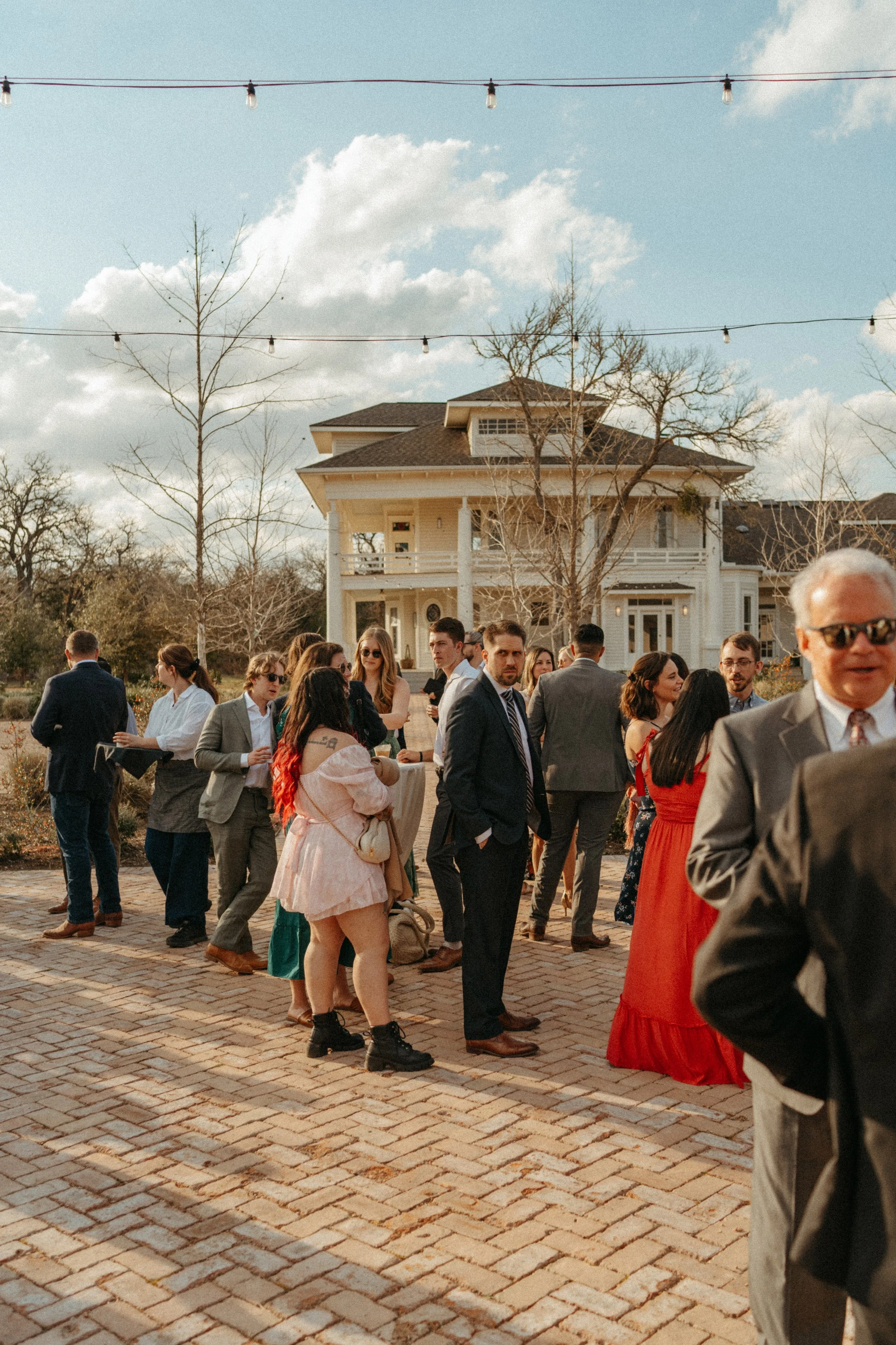 Guests mingling during cocktail hour at The Grand Lady wedding enjoying creature coffee co and drink parch
