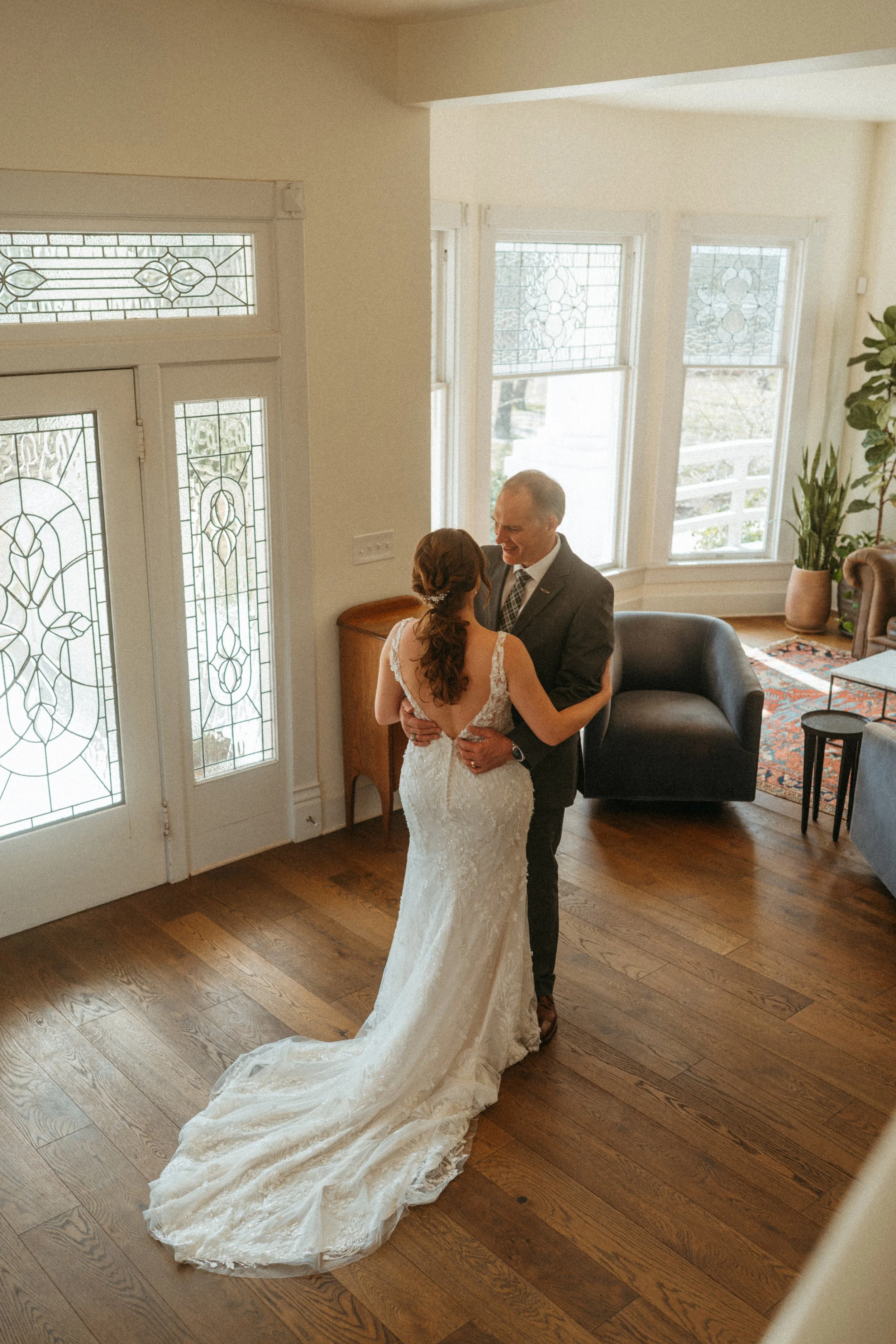 candid of the first look between the bride and the father of the bride at The Grand Lady in manor tx just outside of austin