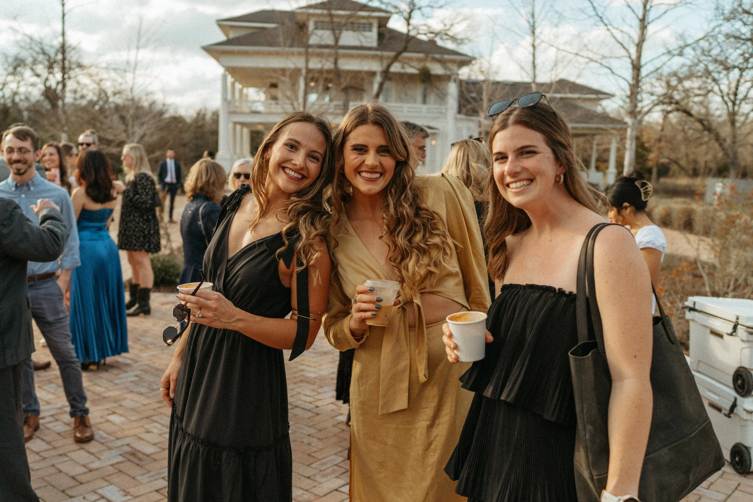Guests mingling during cocktail hour at The Grand Lady wedding enjoying creature coffee co and drink parch