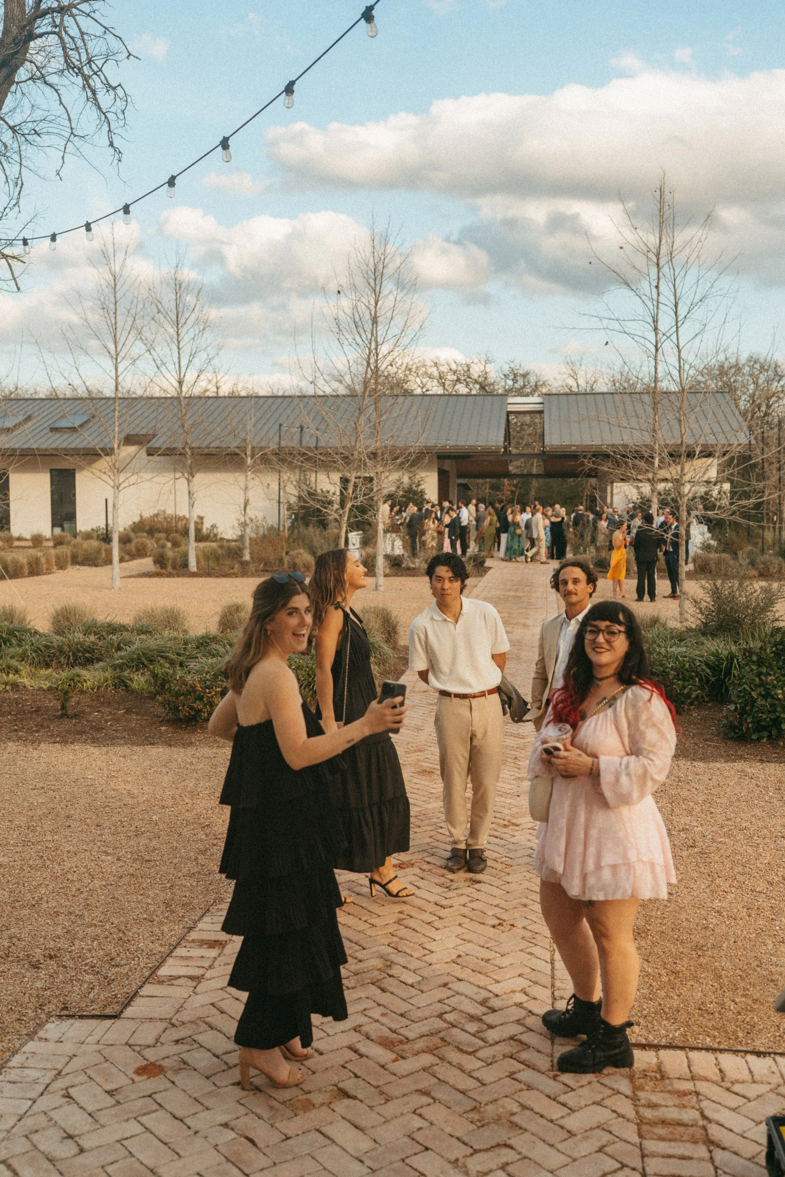 Guests laughing during cocktail hour at The Grand Lady wedding
