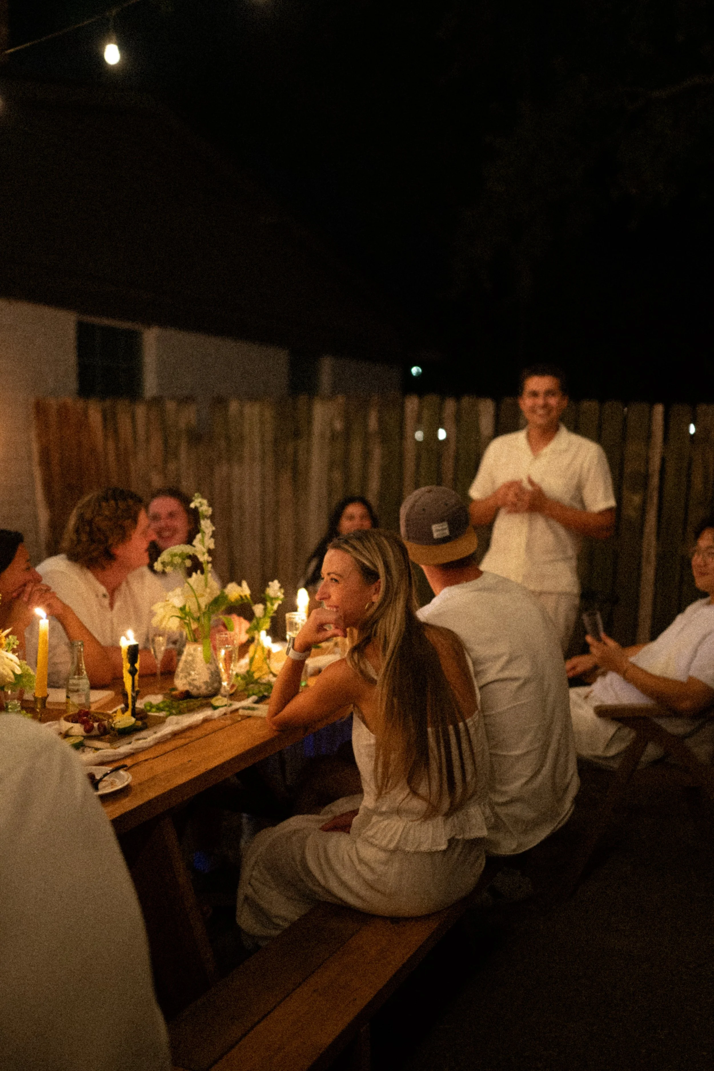 Austin wedding photographer capturing heartfelt speeches at engagement party