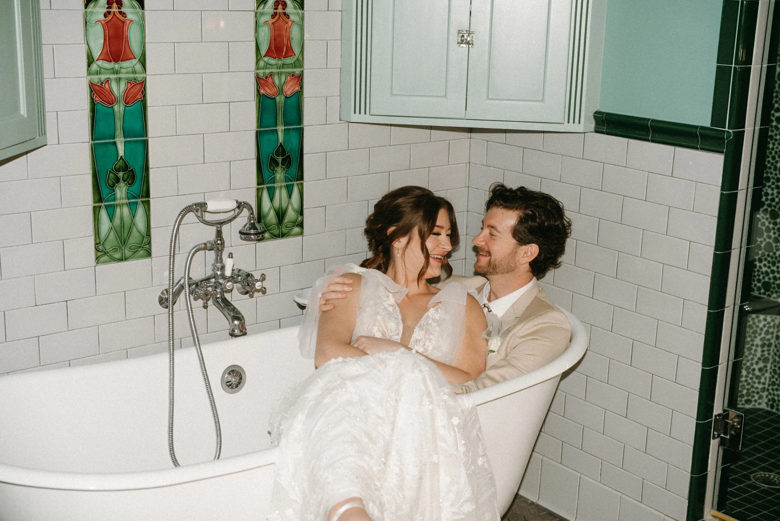Joyful couple portrait in mansion bathroom at The Grand Lady in austin tx