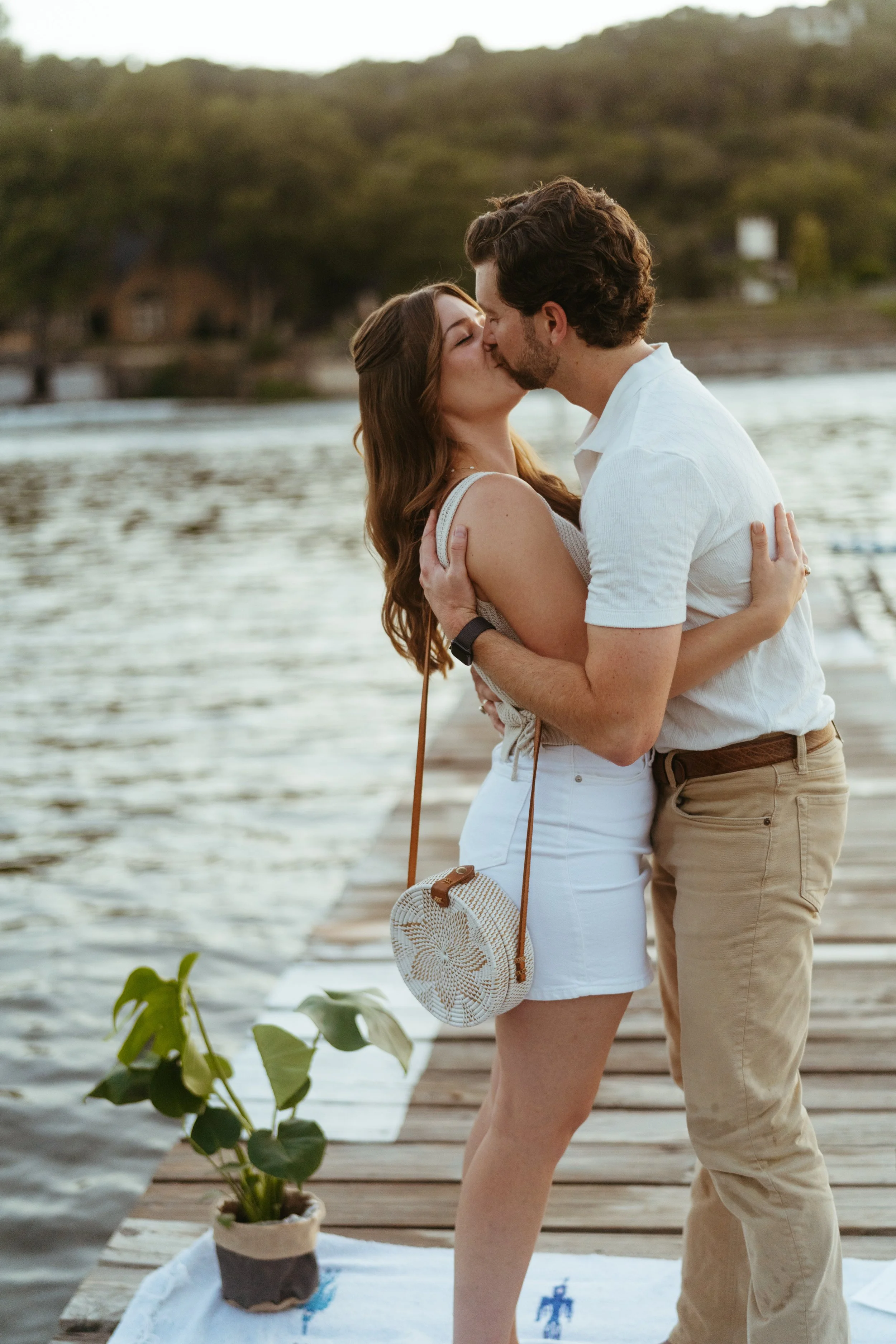 Wedding photographer in Austin capturing romantic proposal session at golden hour
