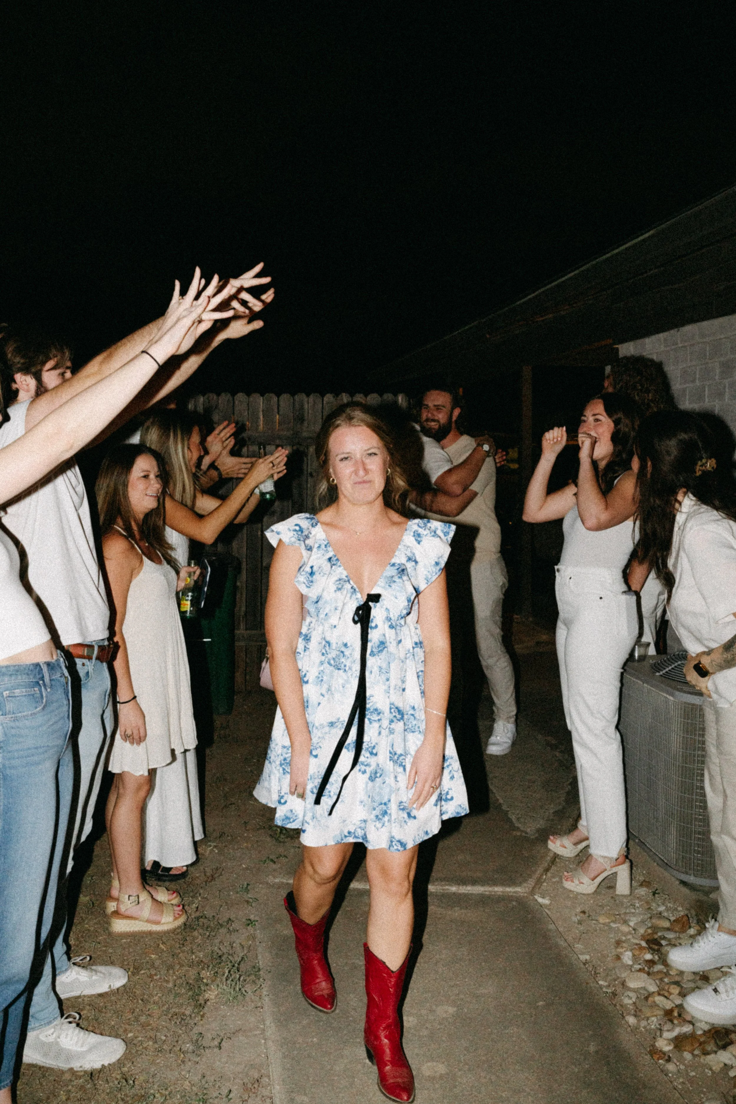Bride-to-be celebrating with friends and family after proposal in Austin