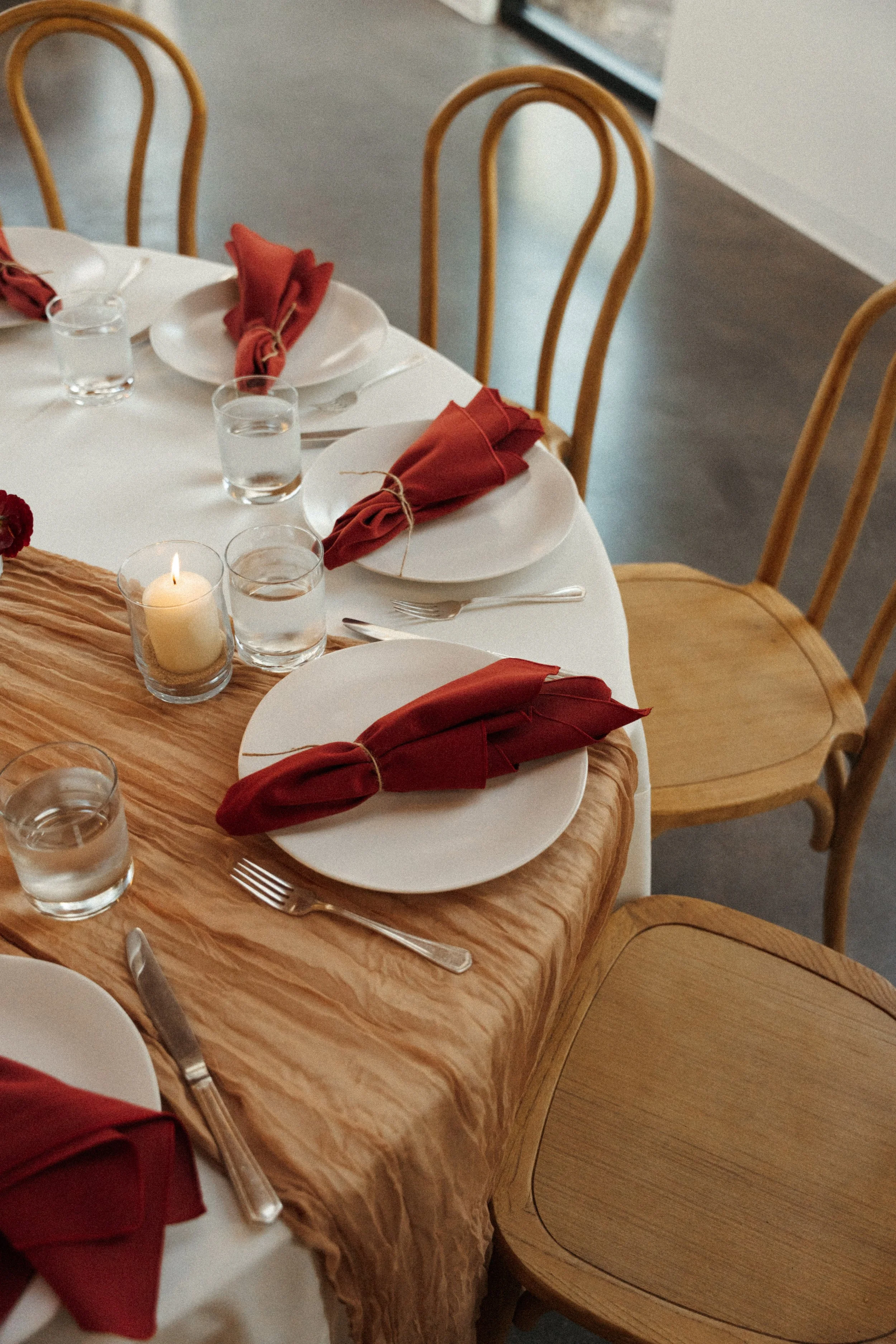 place settings and candles at The Grand Lady wedding reception hall