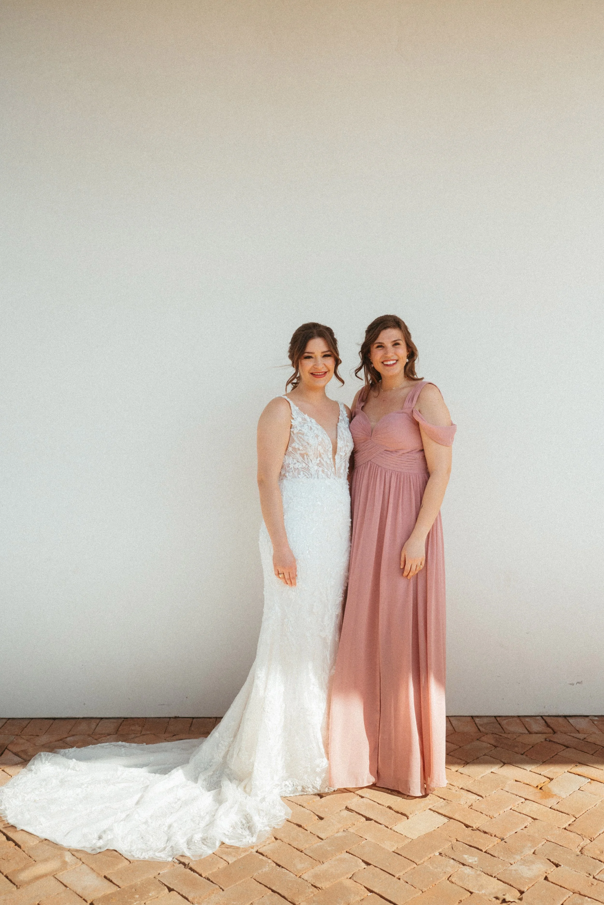 Bridesmaid in beautiful pink bridesmaids dress at The Grand Lady Austin wedding