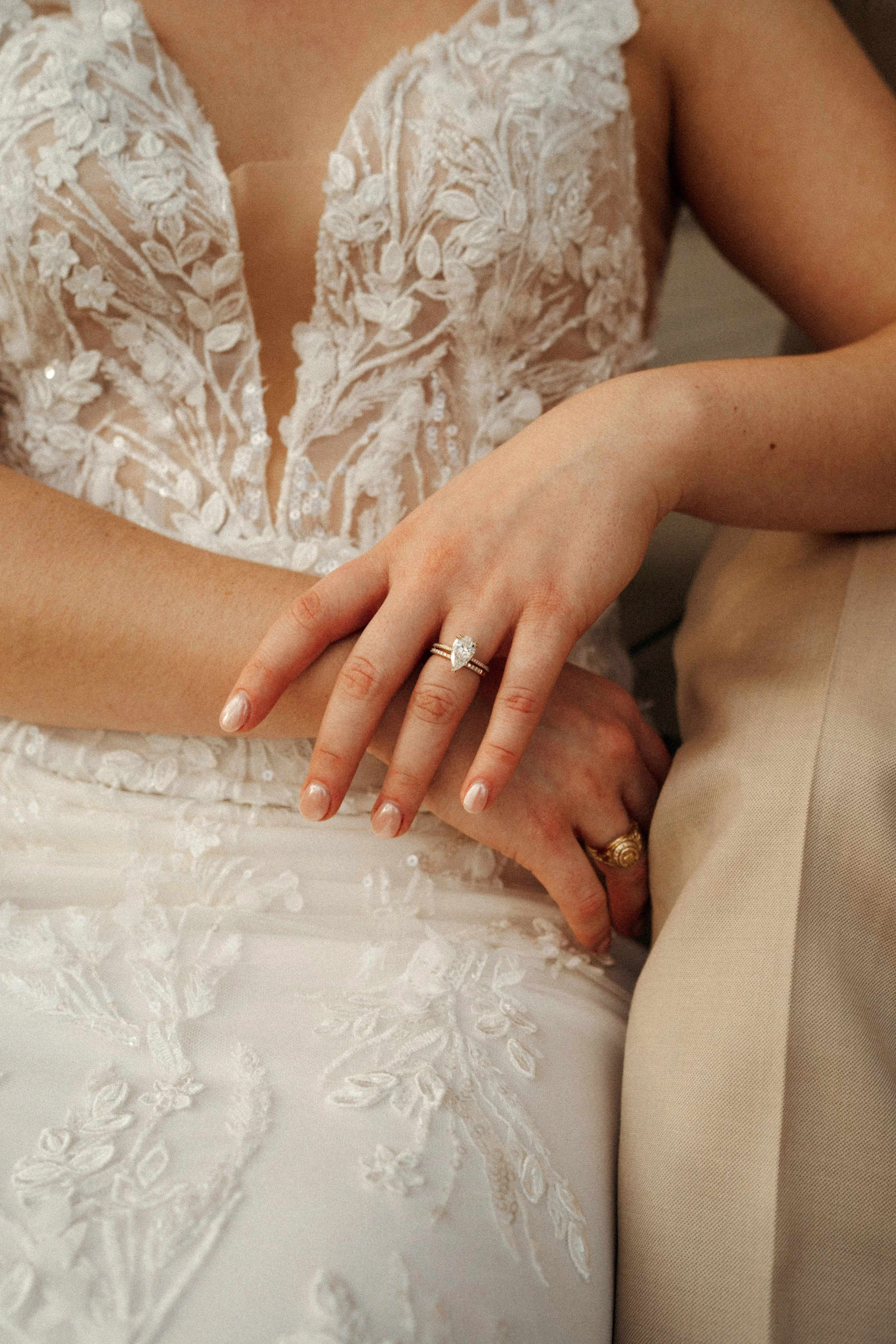 Sunset couple portrait by the mansion at The Grand Lady Austin wedding venue including ring details