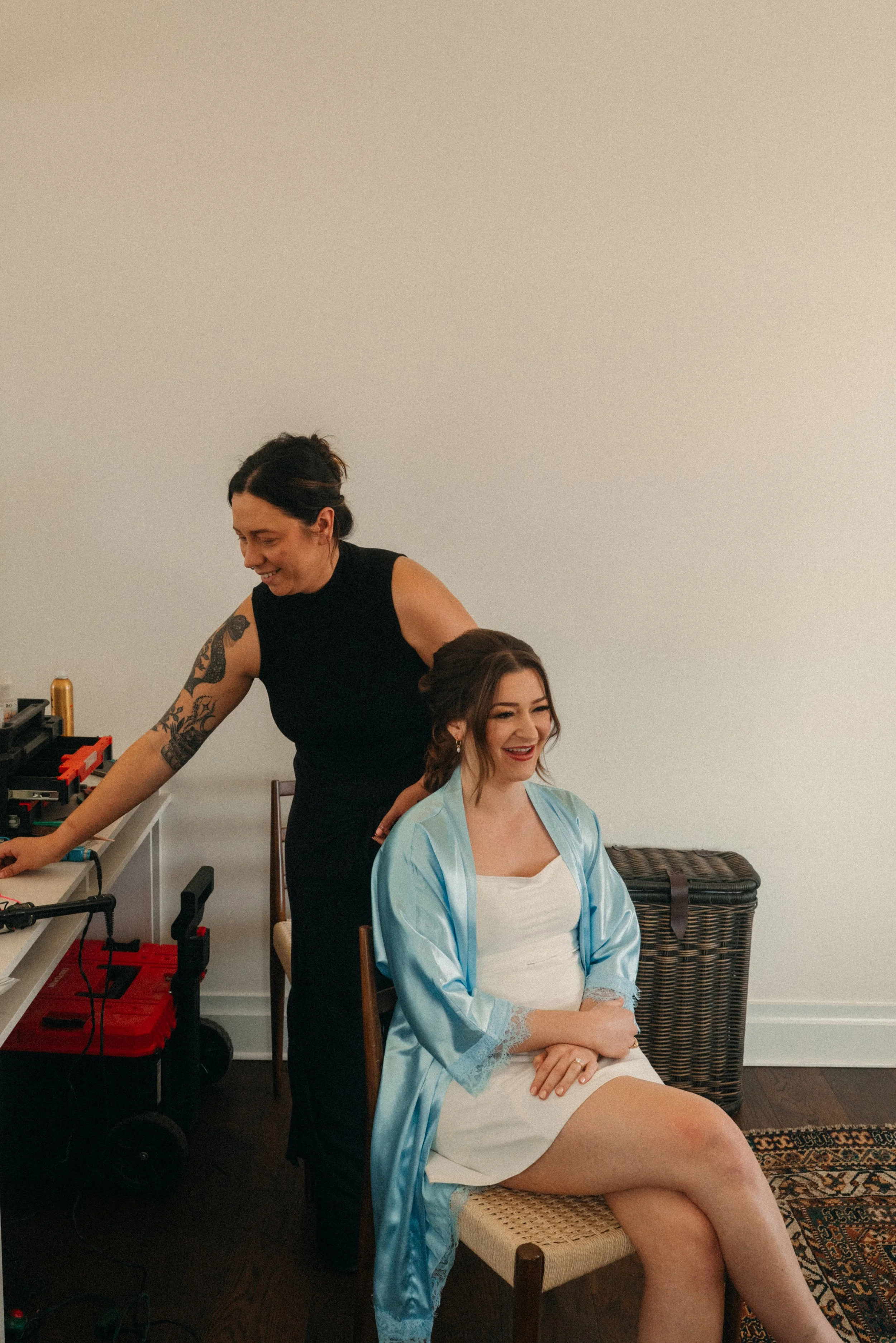 Bride getting hair and makeup done at The Grand Lady in manor tx