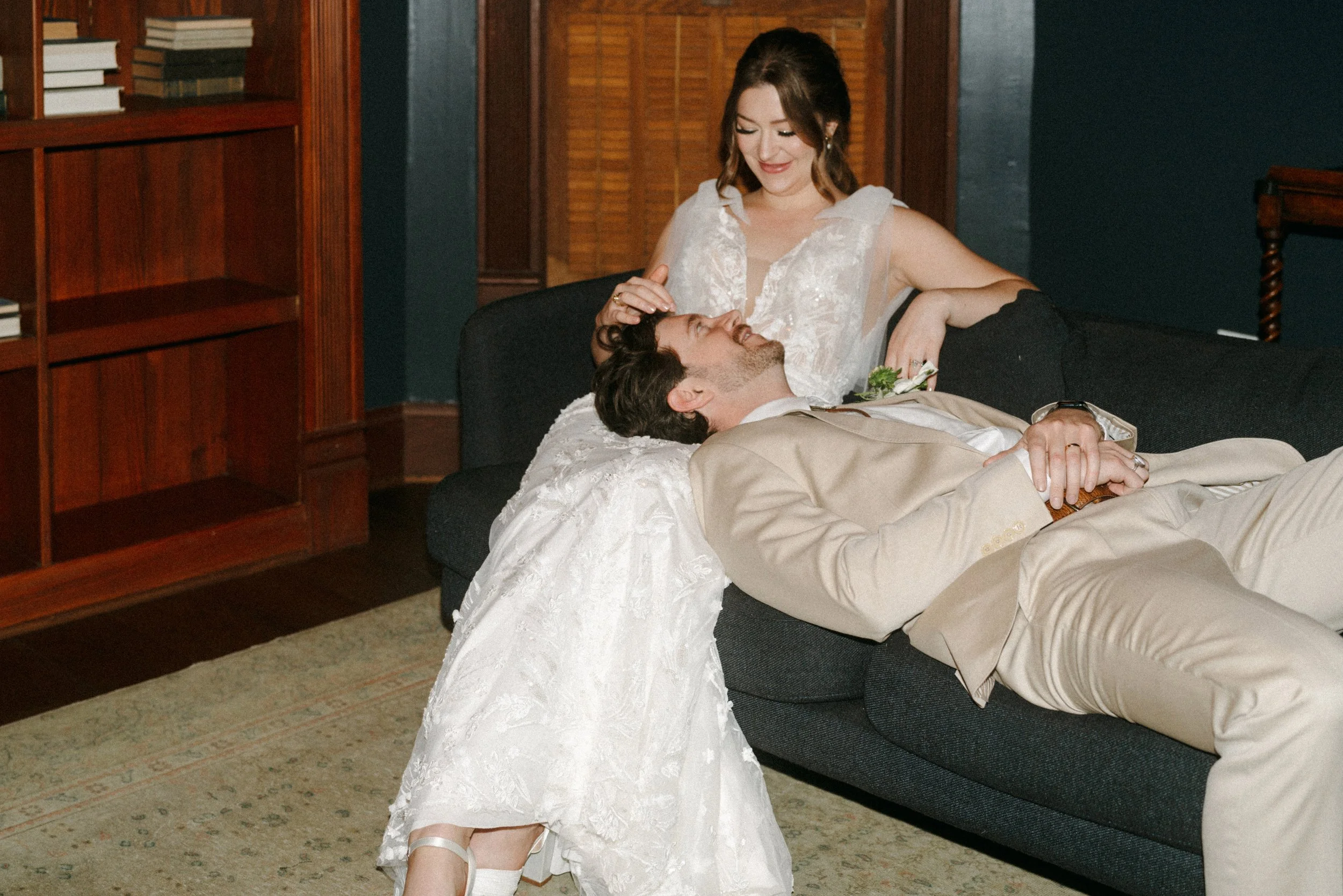 Joyful couple portrait in The Grand Lady old money library